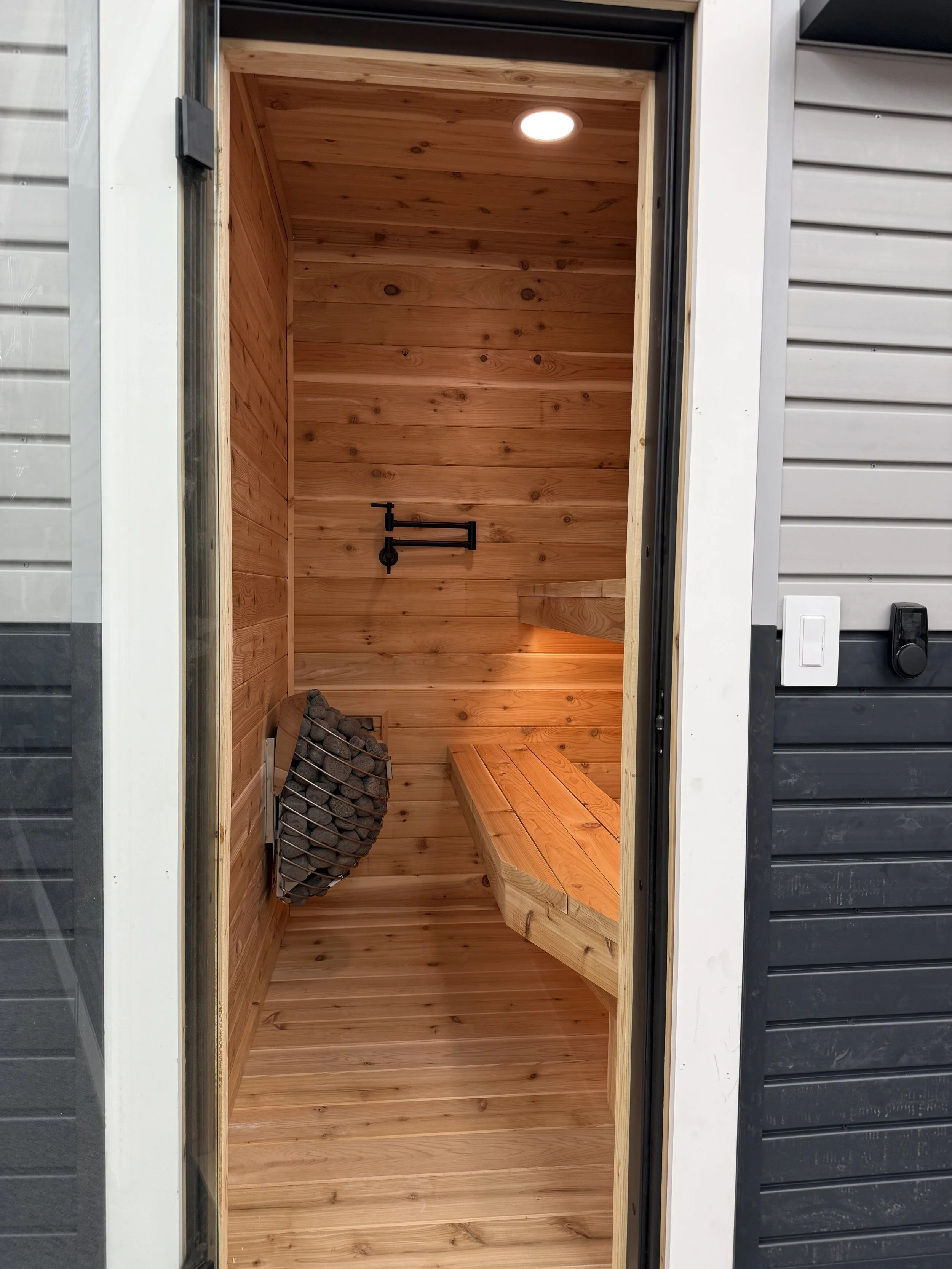 Custom outdoor sauna builder in Dallas Texas using Western Red Cedar with double bench seating by TexZen Builds