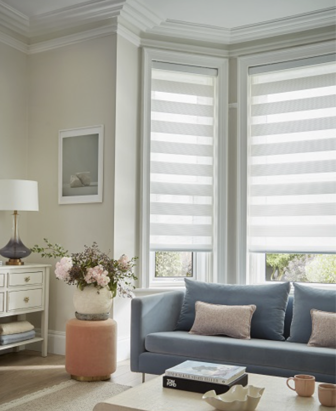 pleated grey blinds in livingroom from trinity shutters