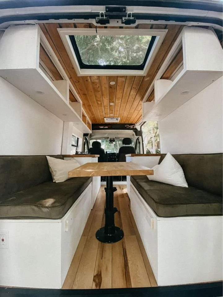 Architecturally refined custom van rear layout featuring precision-fit panels and durable finishes.