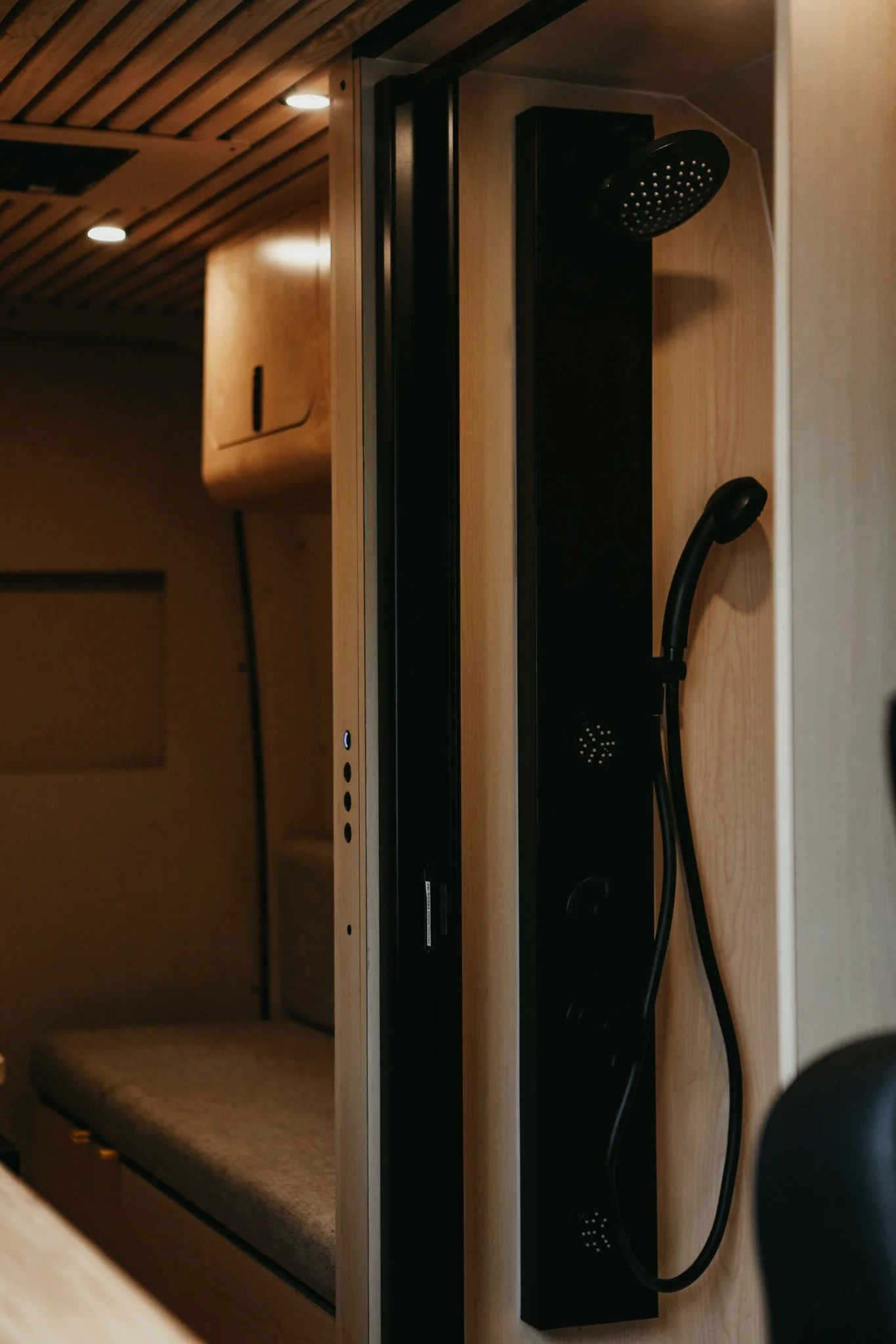 Shower in sprinter van showcasing rixen hydronic install by The Good Van