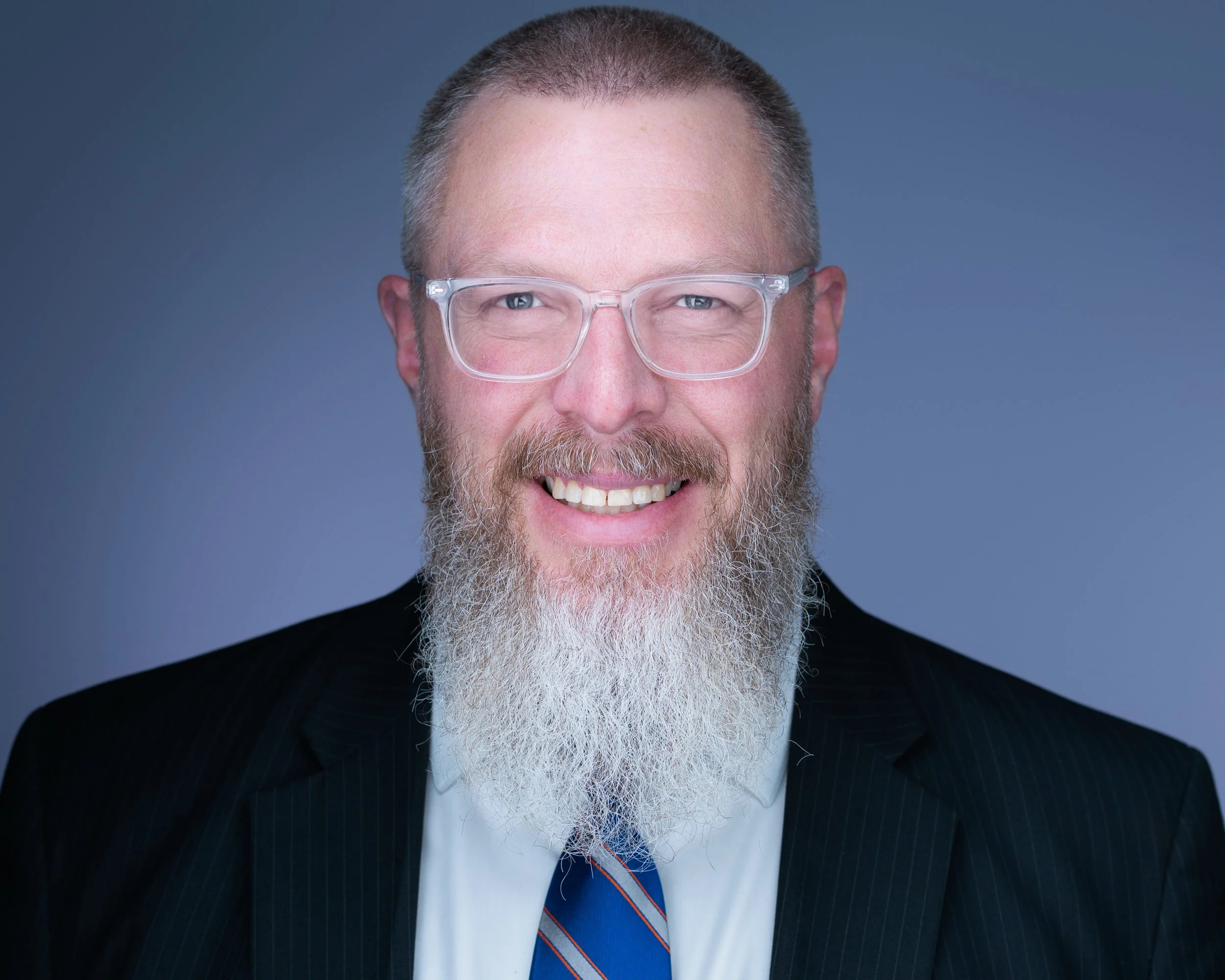 University professor headshot in NYC, looking intellectual and approachable by Eclipse Headshots.