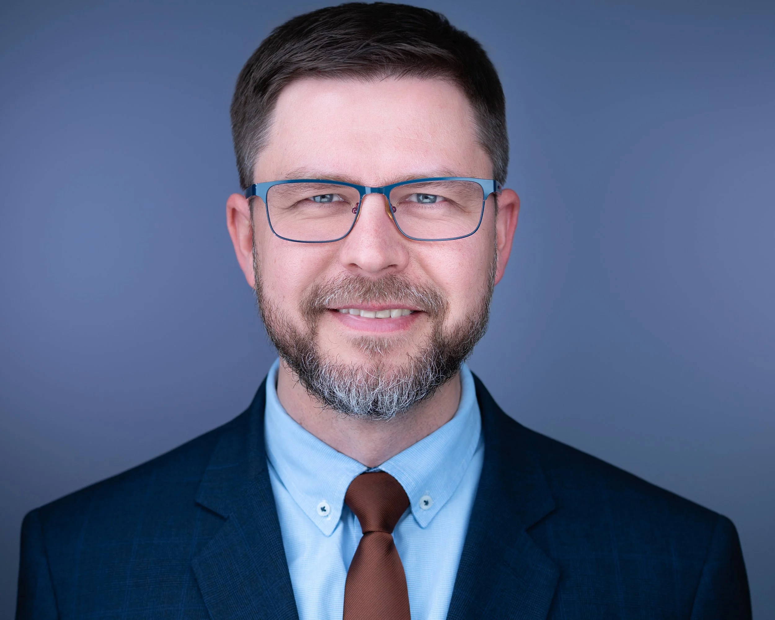 Male physician headshot in NY, establishing medical authority and patient trust with Eclipse Headshots.