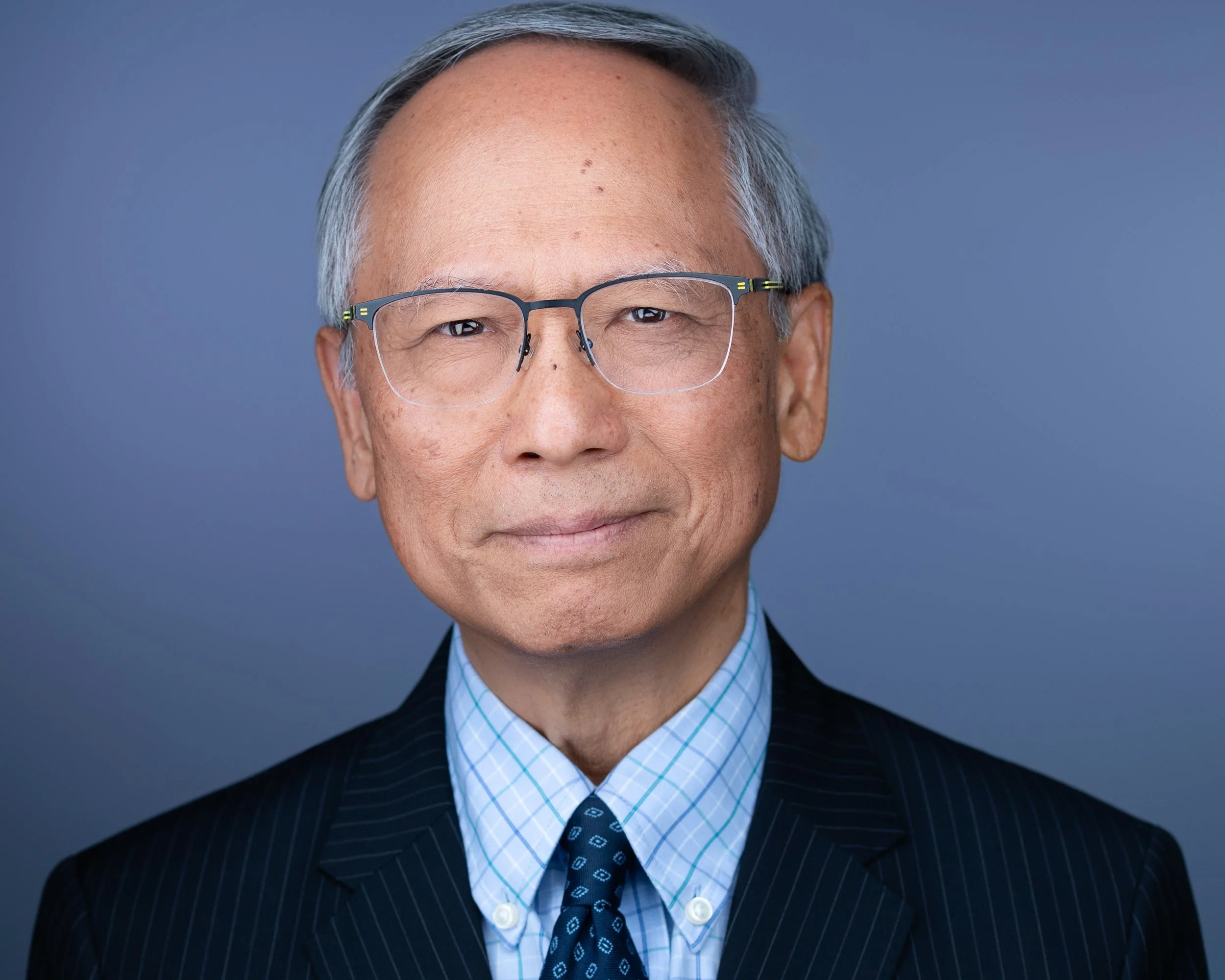 Confident male CEO headshot in NJ, photographed by Eclipse Headshots to display authority and competence.