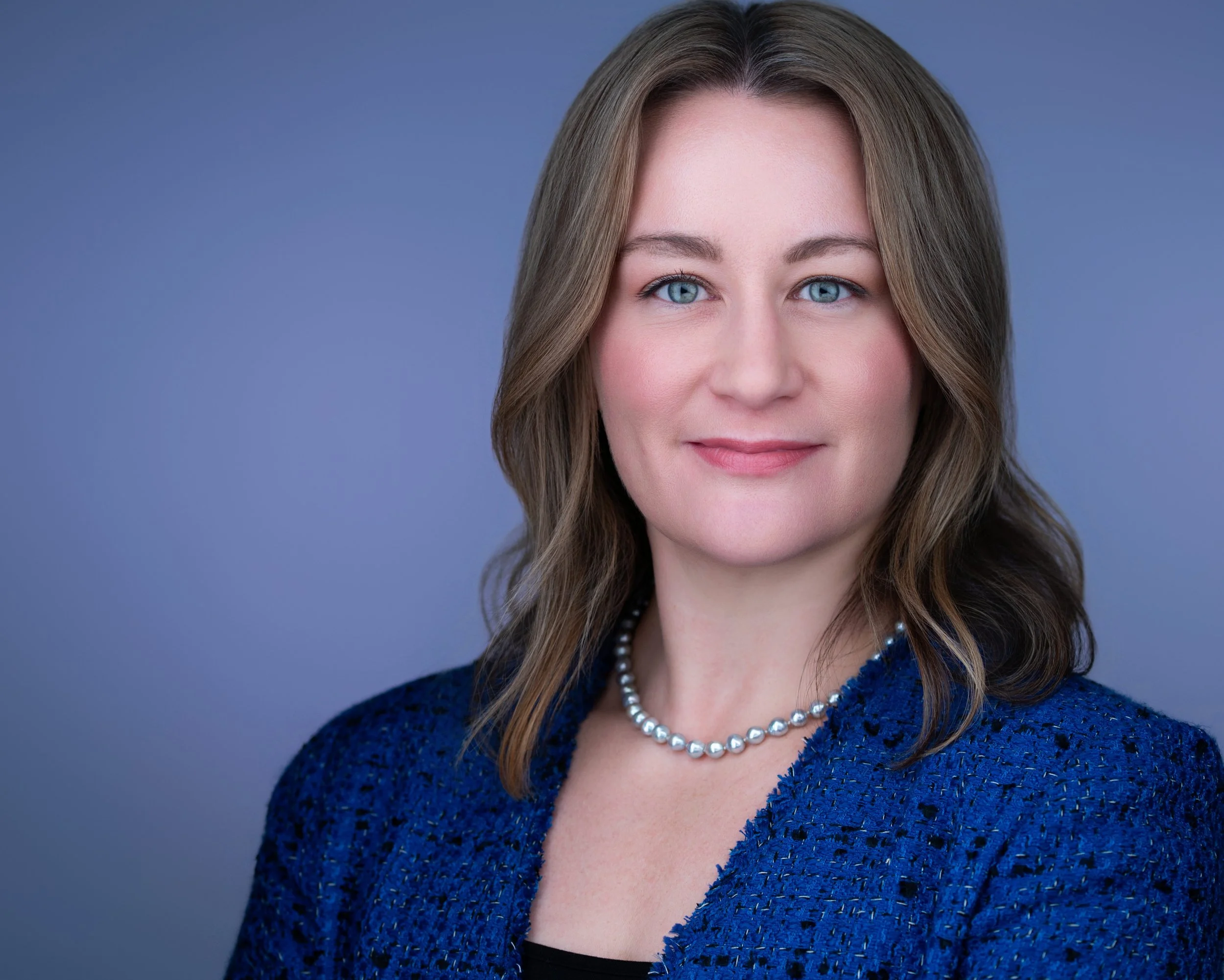 Professional female attorney headshot in NYC designed to build trust and credibility for law firms.