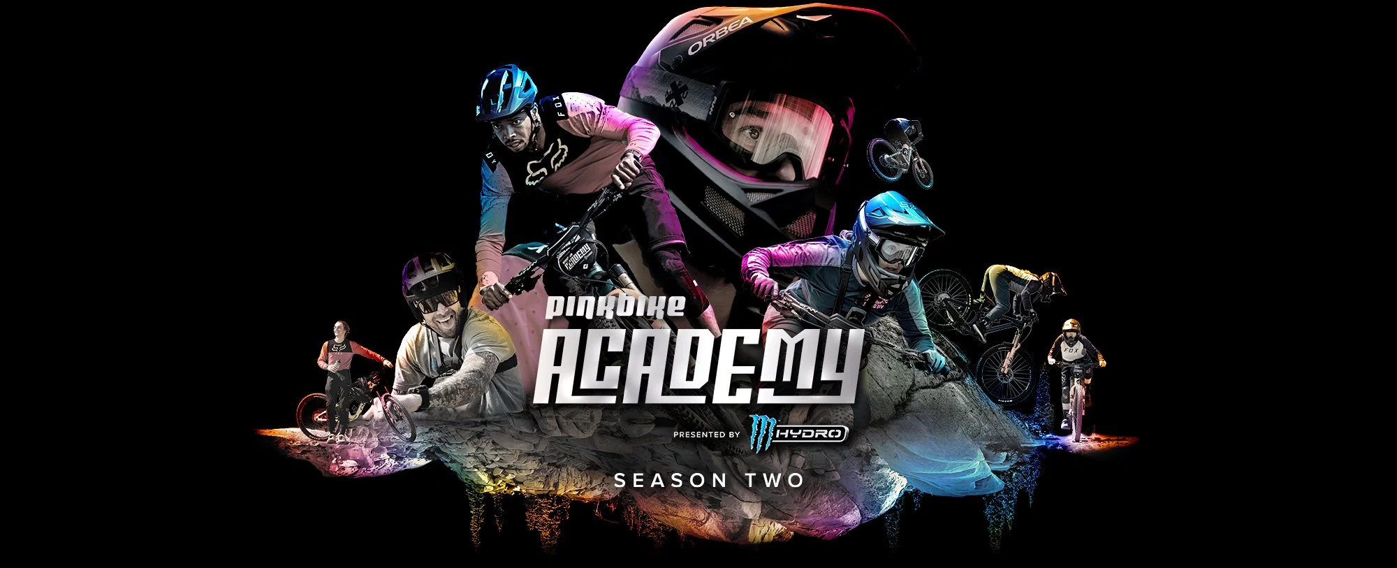 Promotional poster for Pinkbike Academy Season Two, featuring mountain bikers wearing helmets in various action poses, a large mountain with a giant helmet at the top, and the event's logo.