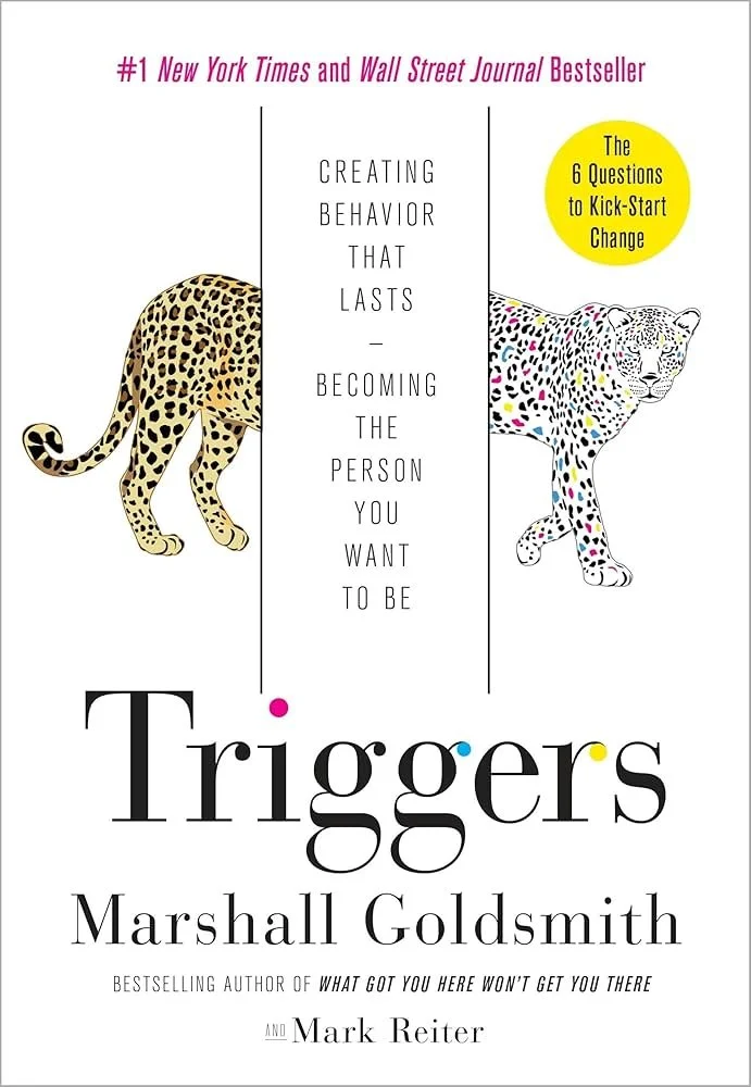 Book cover of "Triggers" by Marshall Goldsmith with illustrations of a leopard and a jaguar.