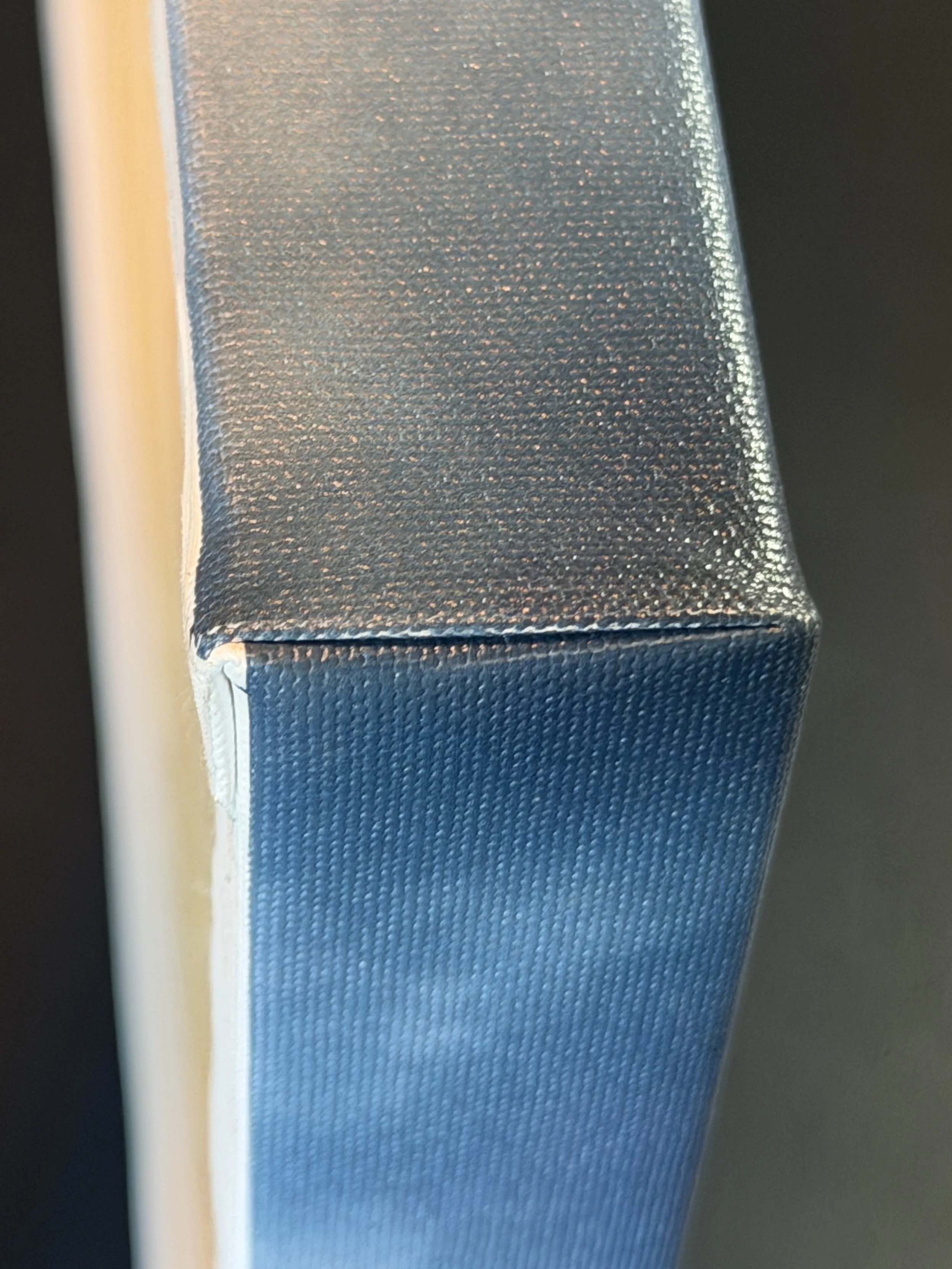 Close-up of corners and material of stretched canvas