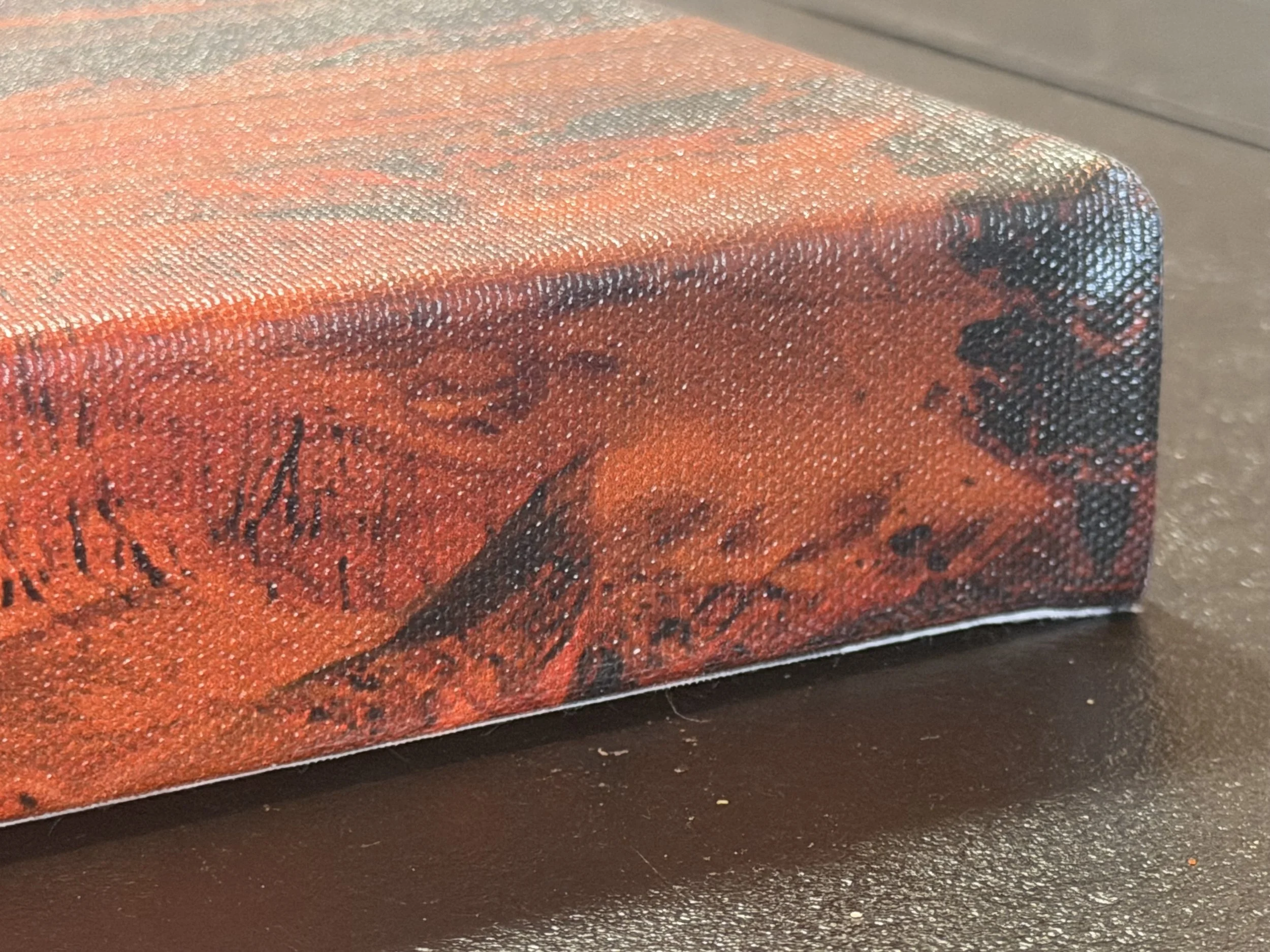 Close-up of the thickness of 1 1/2 inch Stecher bars on streched canvas