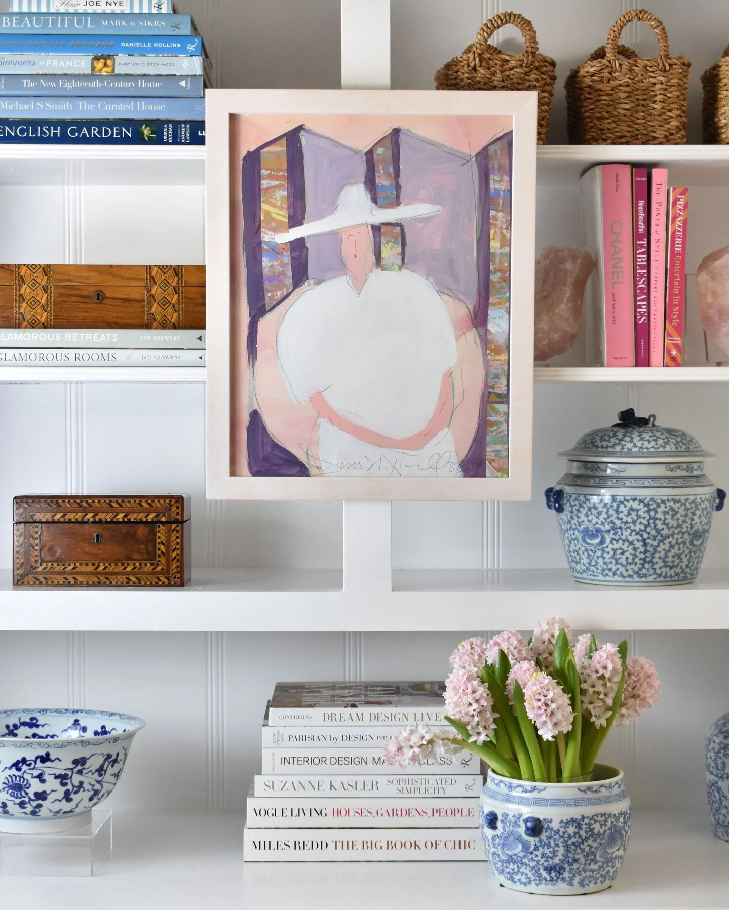 This figurative work in blush tones sits perfectly among art books and collected objects&mdash;proof that art works everywhere, not just on walls. 

Woman in White Hat
Signed: lower right, &ldquo;Jim N. Hill &lsquo;83&rdquo; 
Mixed Media 16.5 x 20.5 