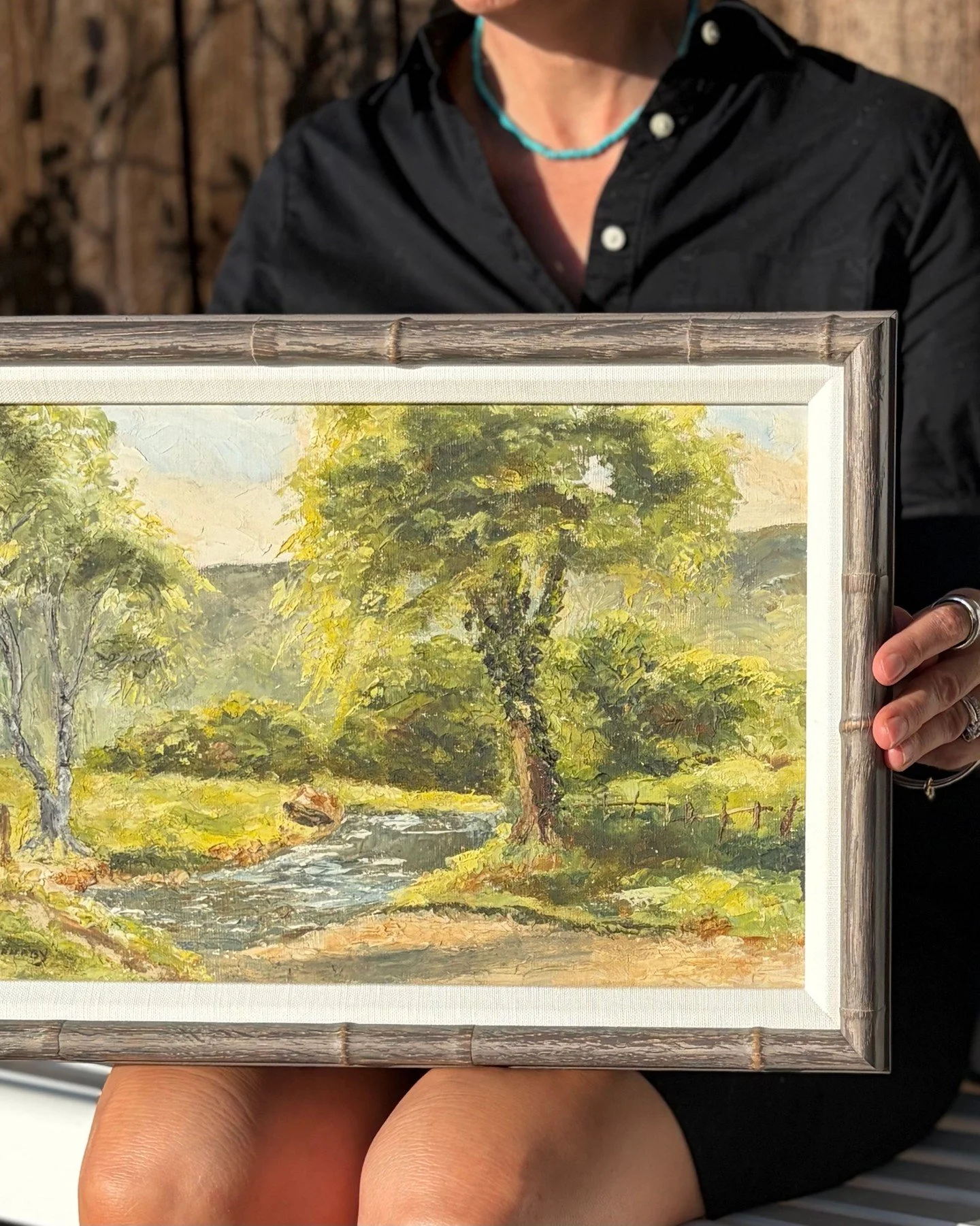 Artist Valerie Barnaby worked in the landscape tradition of North Yorkshire, England &mdash; quiet streams, grazing fences, the particular green of English summer. The impasto in the tree canopy of this piece - The Ford at Dale End, Rosedale - nicely