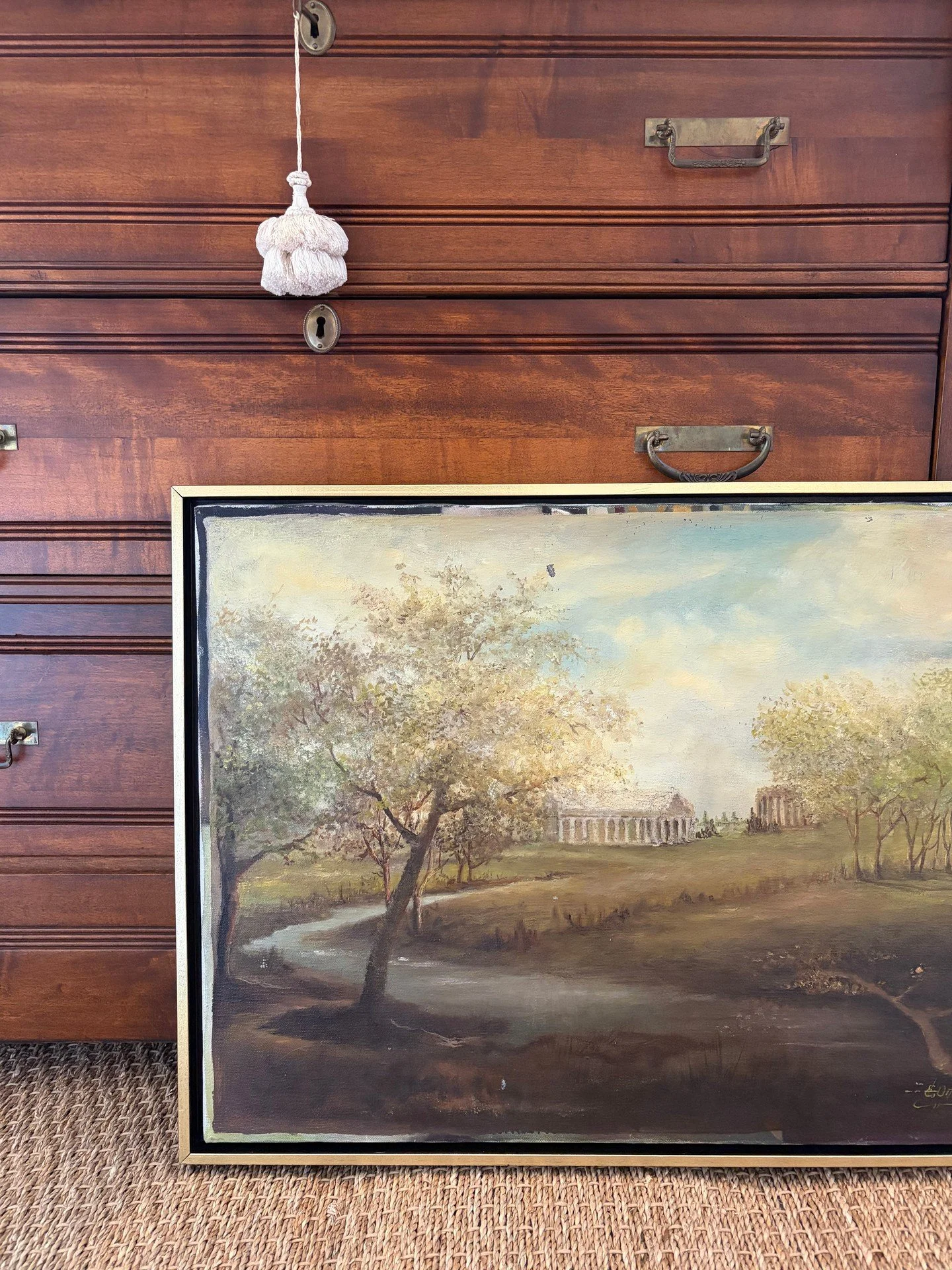 A calming landscape brings both serenity and interest to any room. This example prompts even more conversation because of mysterious underpainting beneath; visible just around the edges of the canvas, previously hidden by framing.

oil on canvas
25.2