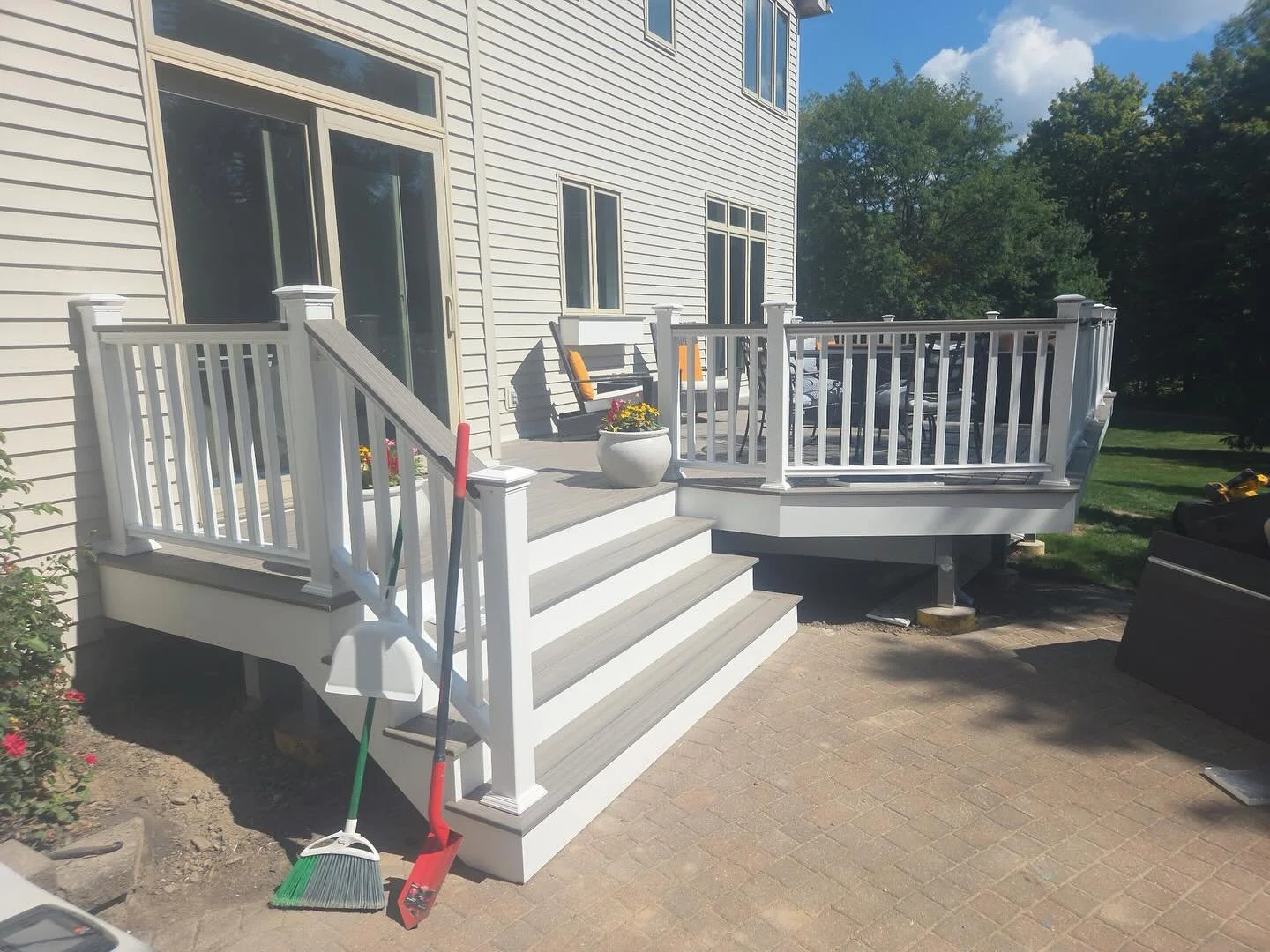 Latest deck project signed, sealed, and delivered!

A sleek new 300 foot deck with vinyl railing and matching composite deck board caps, and what would a new deck be without a new French door install to go with it? 

We are now booking out into next 
