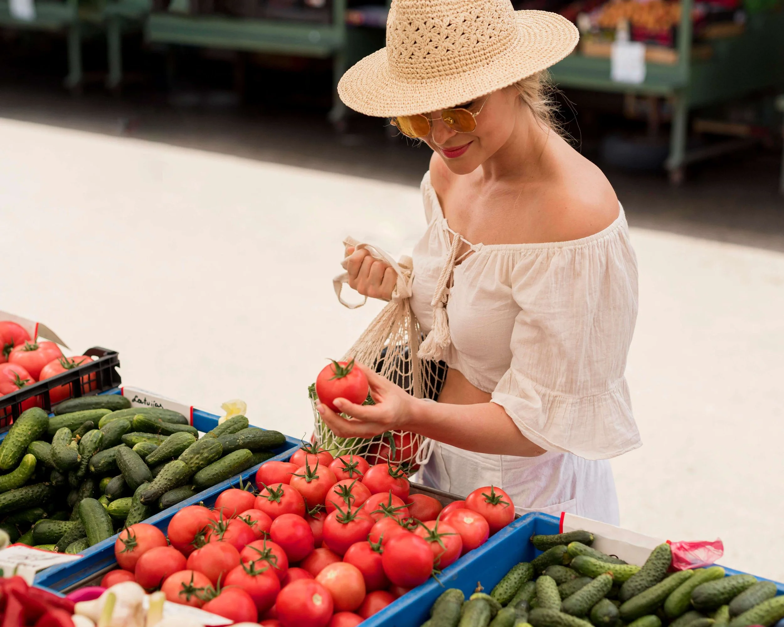 high-view-woman-using-organic-bag-veggies.jpg