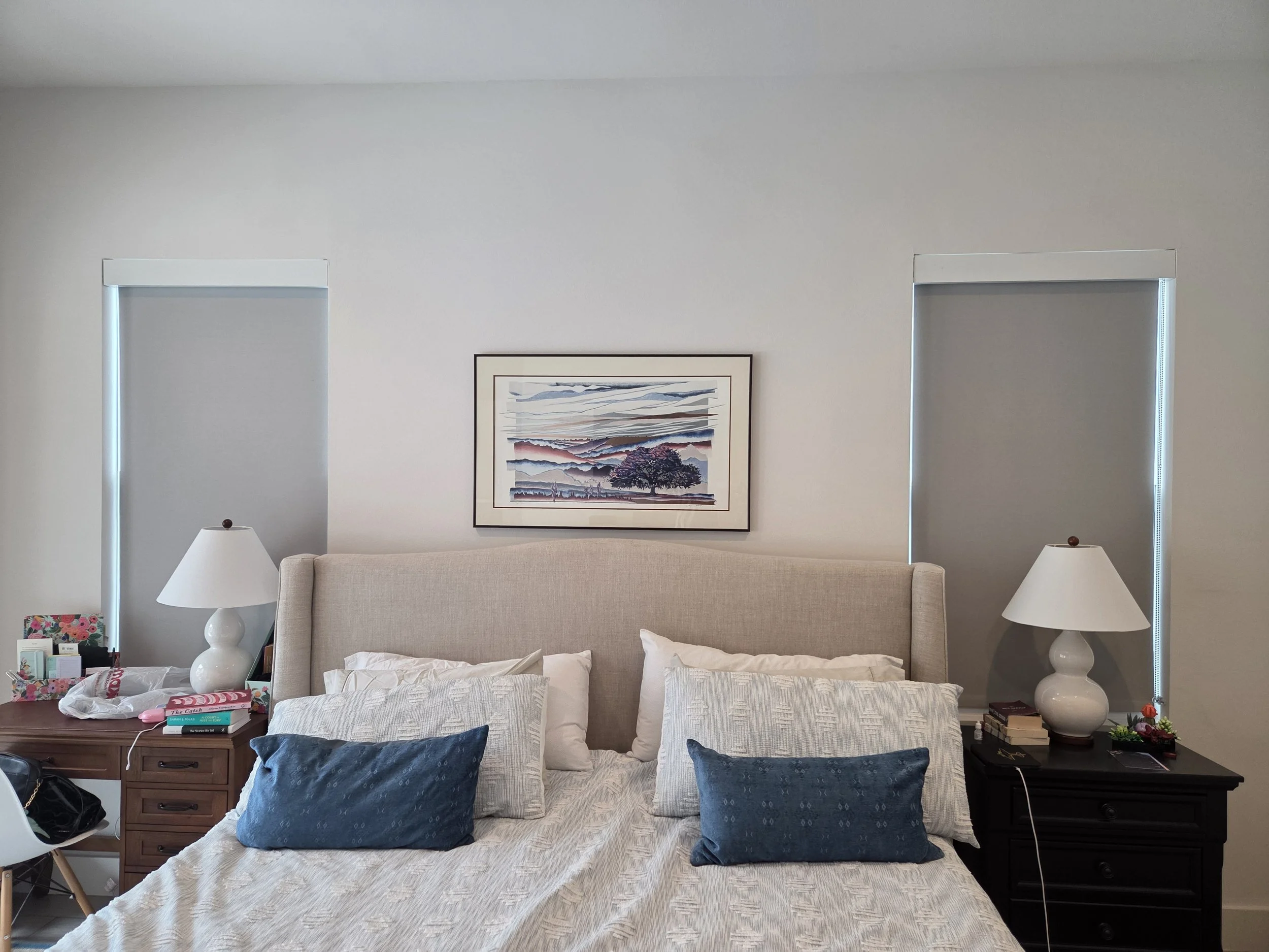 Before picture of bedroom without drapery or bedcovering to be used for a budget design package interior design project.