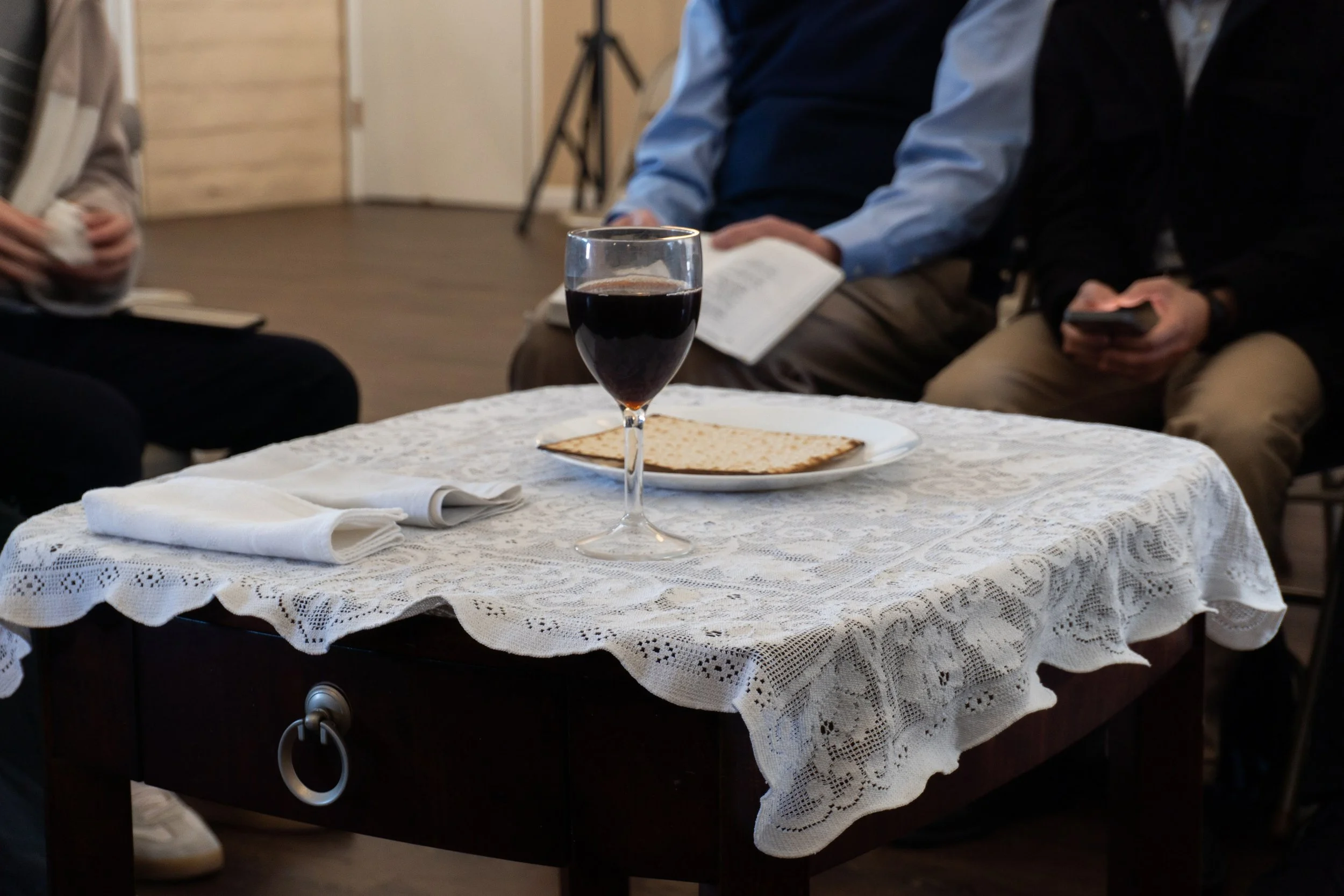 The Lord’s Table with bread and cup during a church gathering in San Luis Obispo, shared by believers in remembrance of Christ