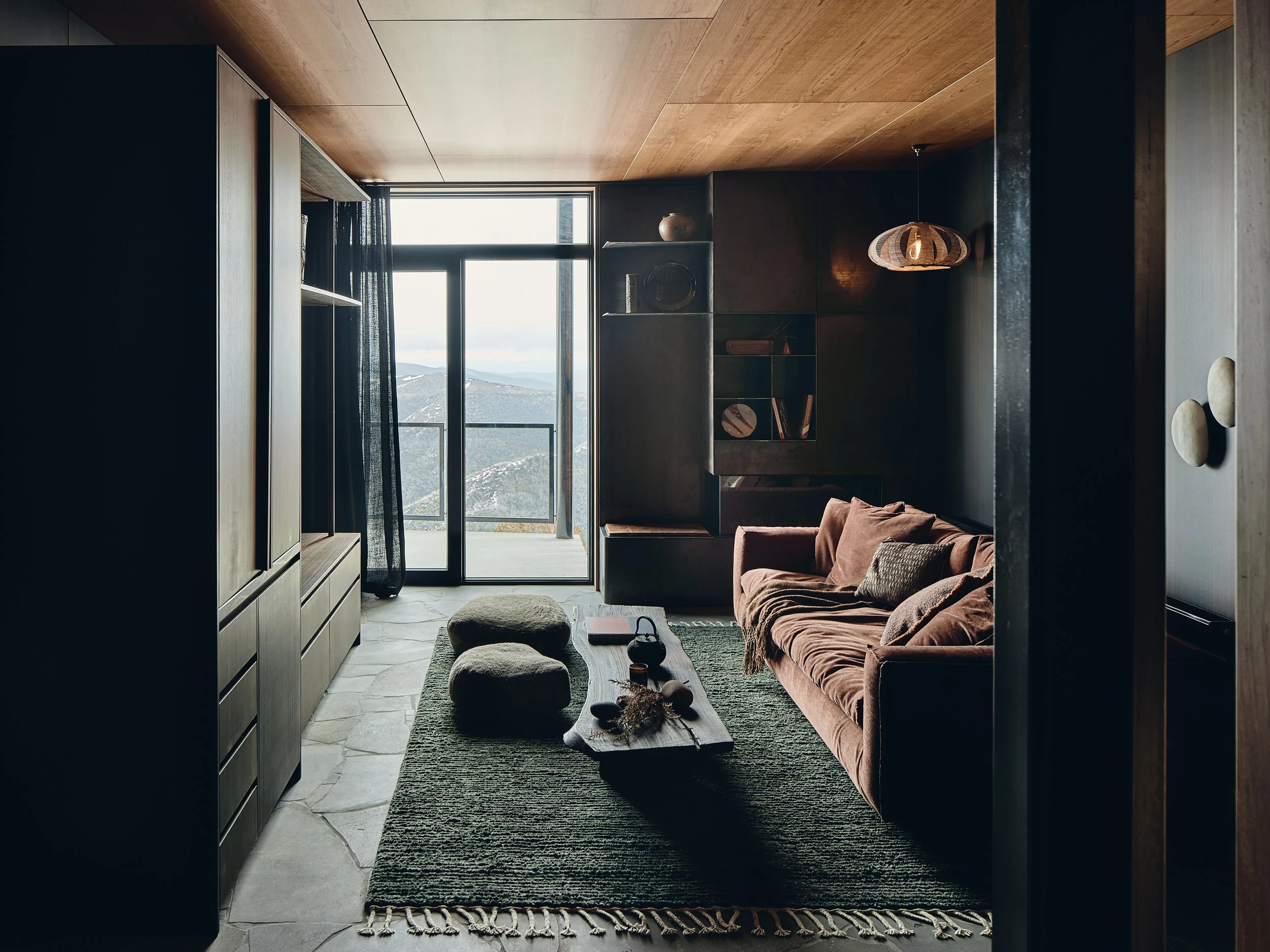 19. Inviting and earthy second living zone.jpg