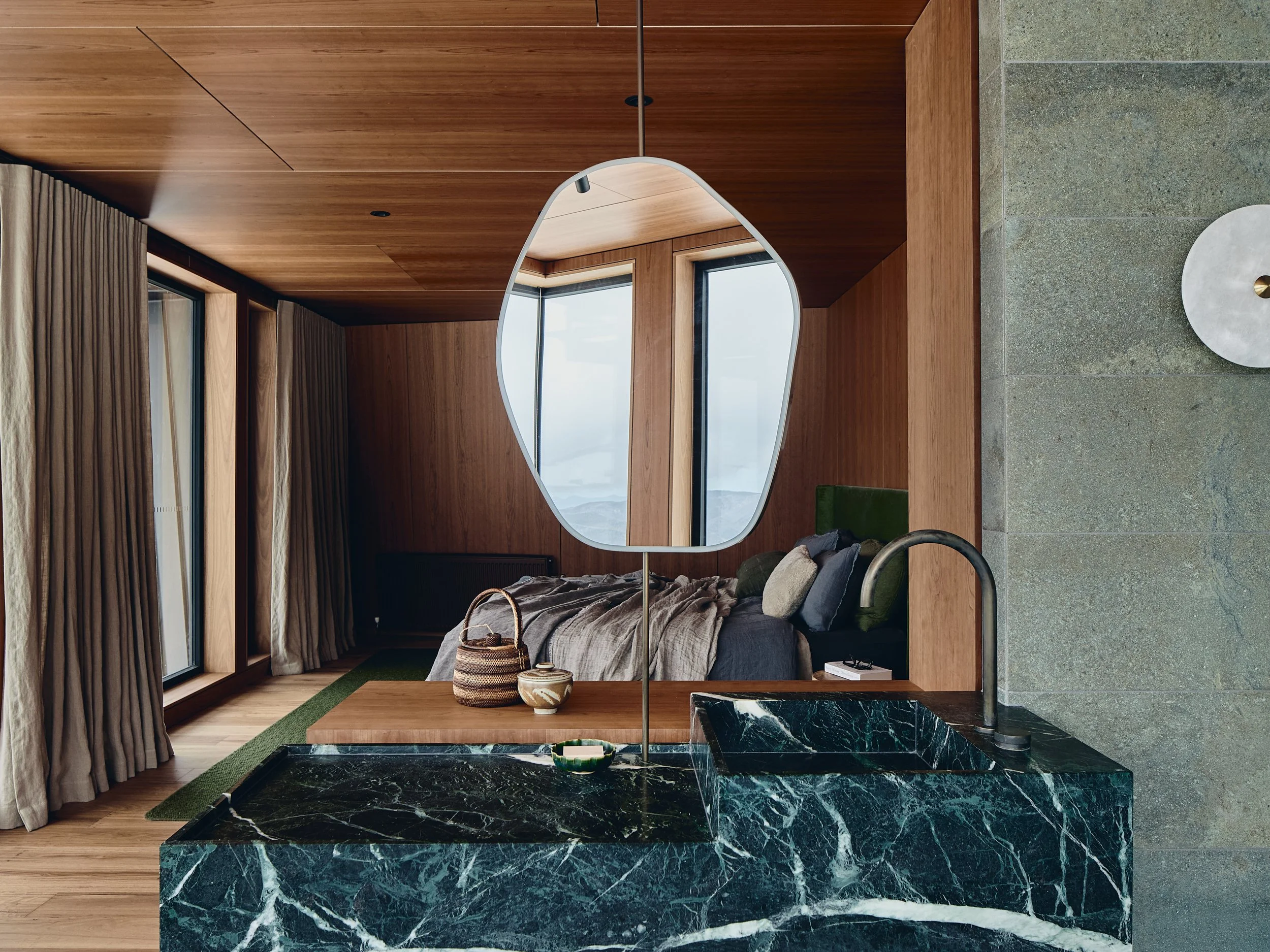 7. Primary ensuite reflecting the landscape in the mirror.jpg