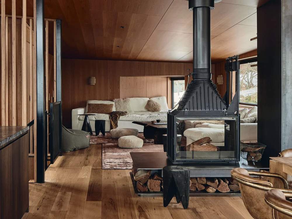Alpine Lodge — main living space with stone fireplace, Mount Hotham