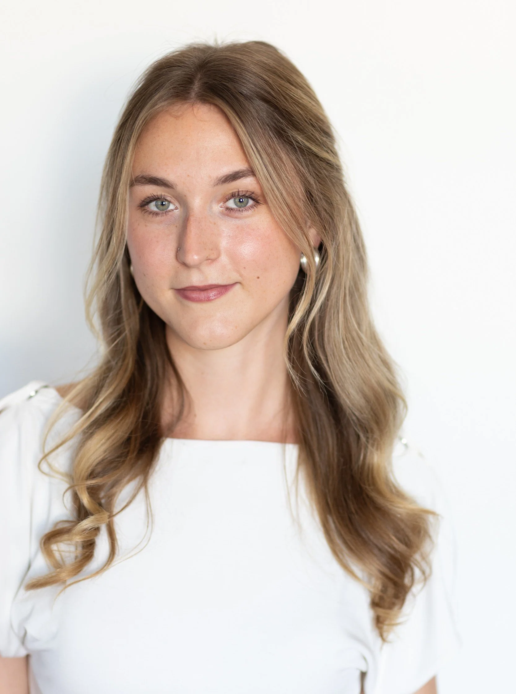 Quinn DeVries Headshot NEW.jpg