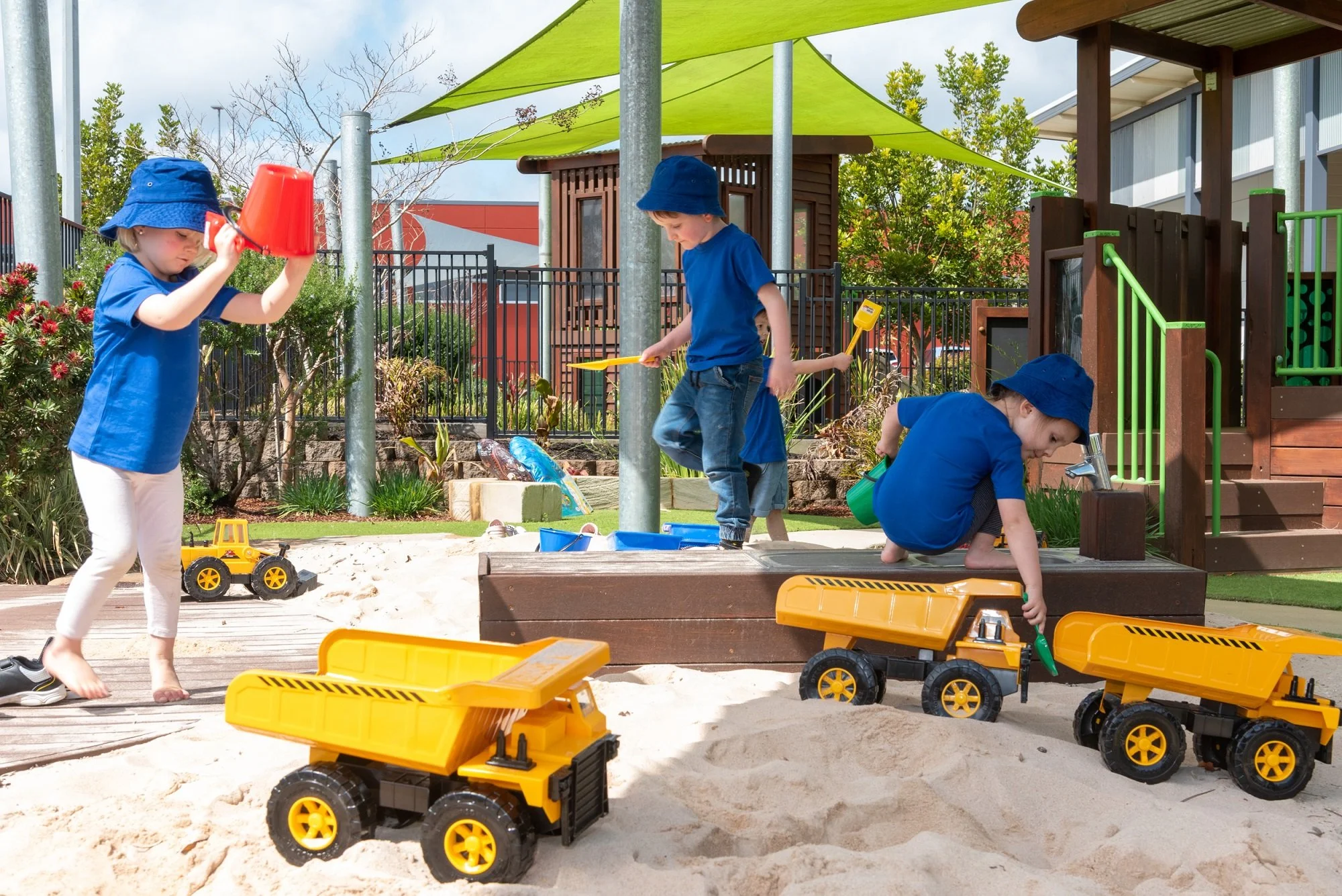 Children play in the sandpit at Highfields Central Early Eduction Centre