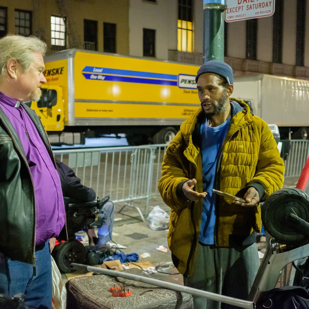 CPE student Jeffrey Melcher talks with an unhoused neighbor