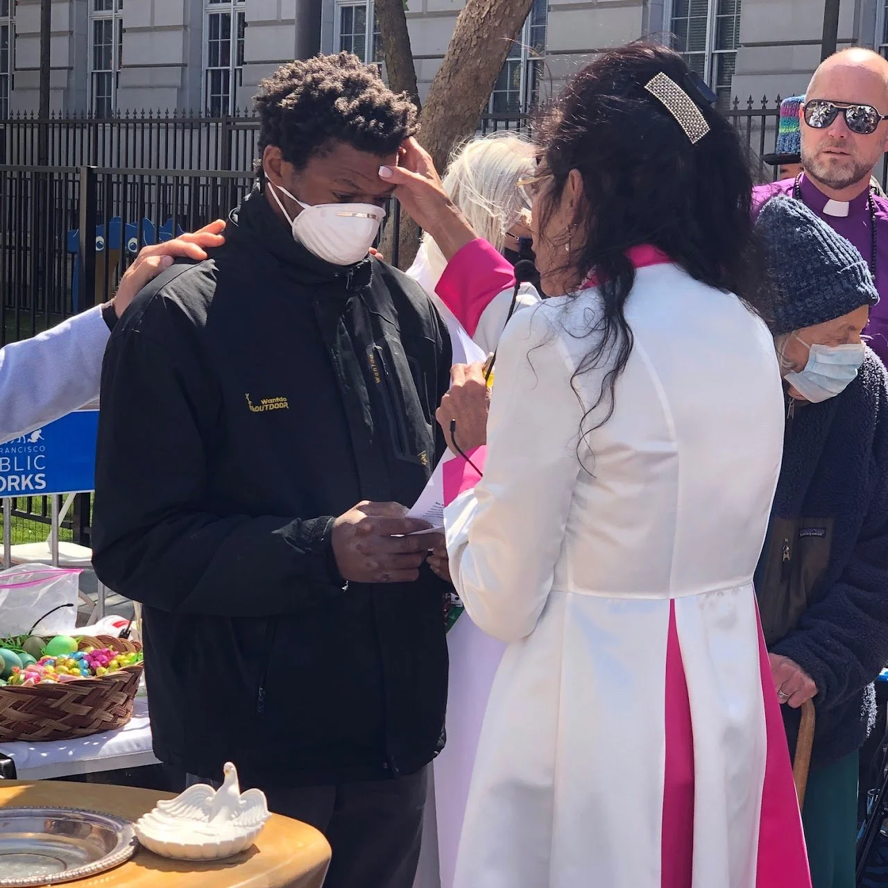 Rev. Monique baptizes OC Usher Marquis on Easter Sunday