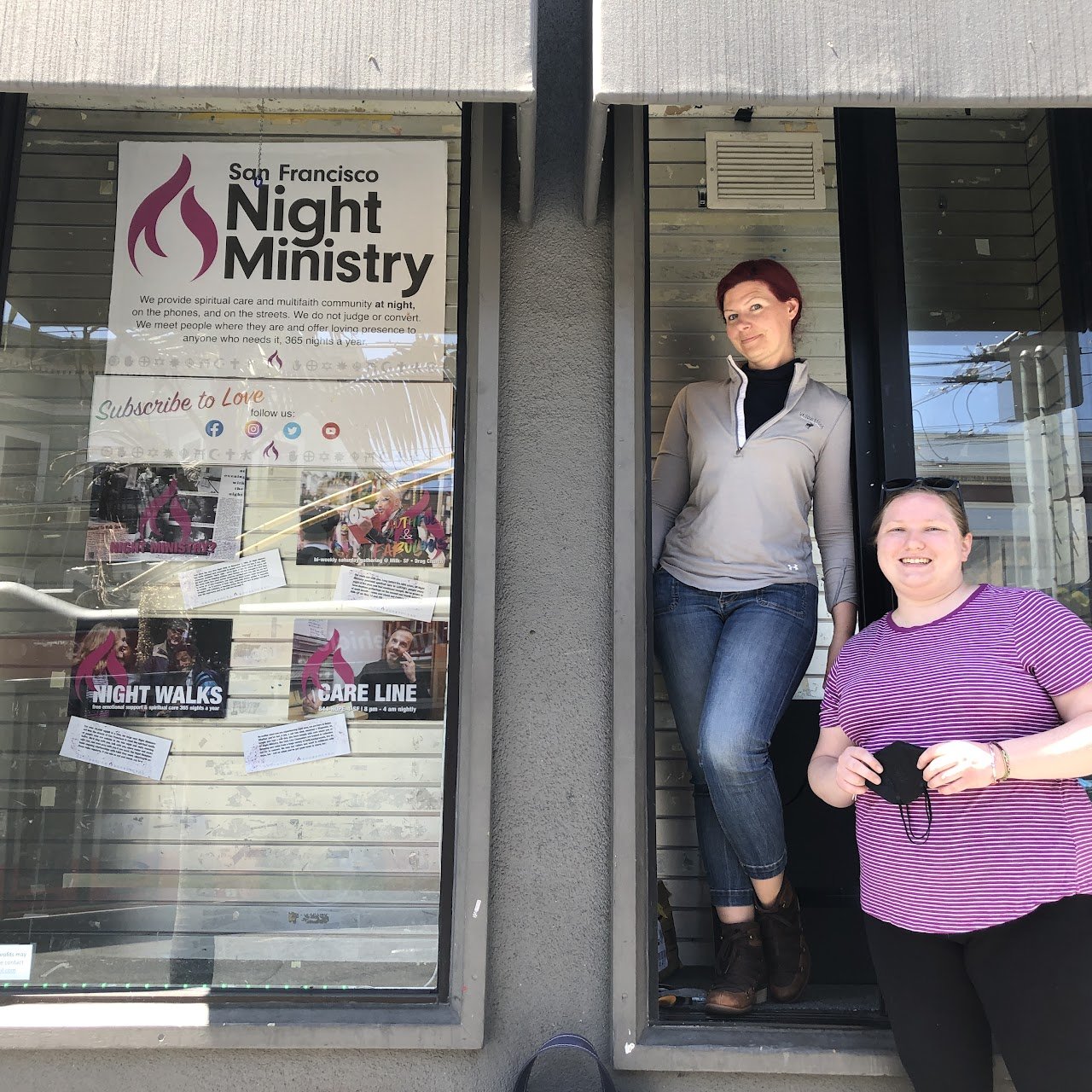 Sam LaDue and CPE Student Sara Yoe install the nonprofit Walgreens window