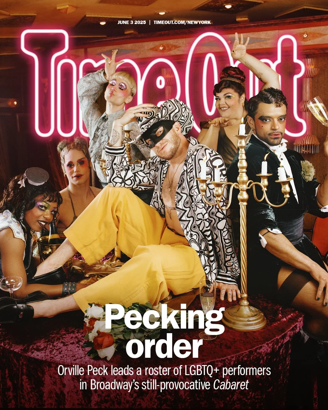 Group of LGBTQ+ performers in colorful costumes and makeup, posing in front of a neon sign that says 'Time Out,' with the headline 'Pecking order' and a subheading about Orville Peck leading a cabaret lineup.