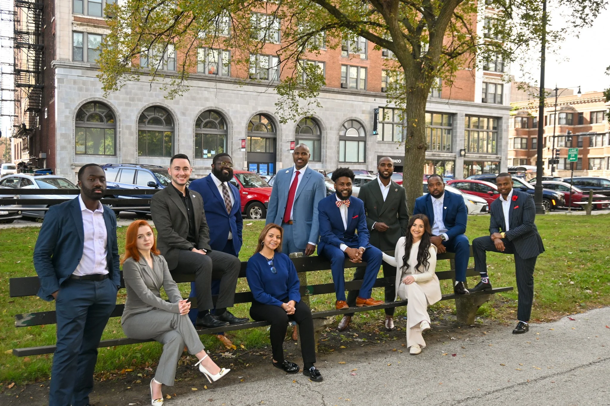 North Western Mutual Team taking a group photo outside the Hyde Park office.