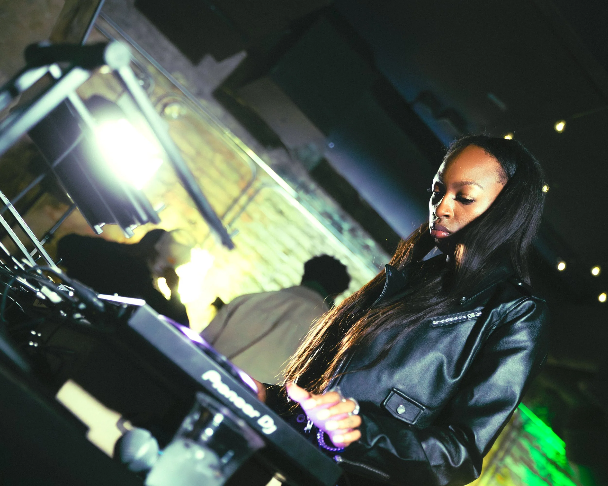 Female DJ performing