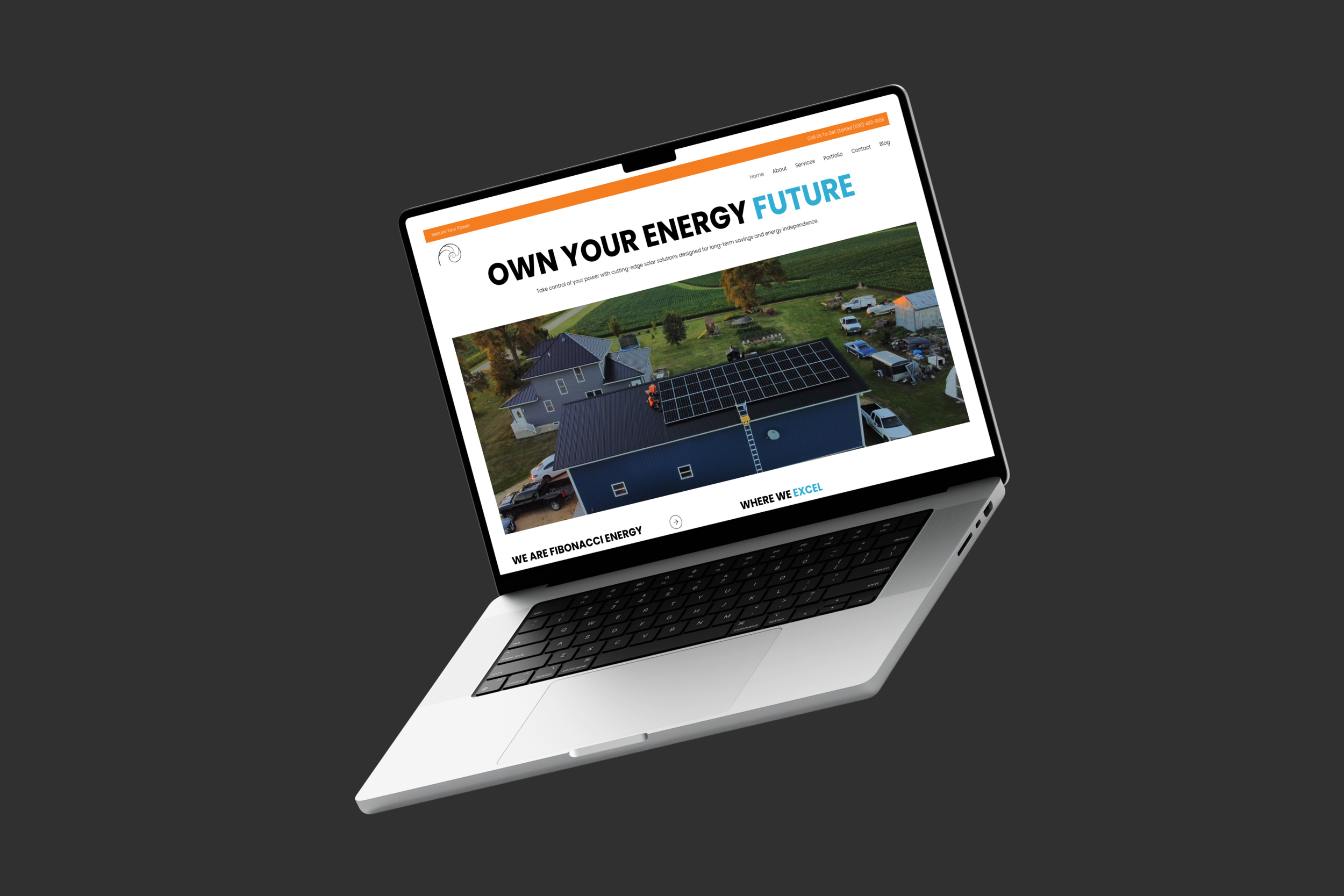 Laptop displaying a webpage about solar energy installation on a residential roof with solar panels, green yards, and parked cars.