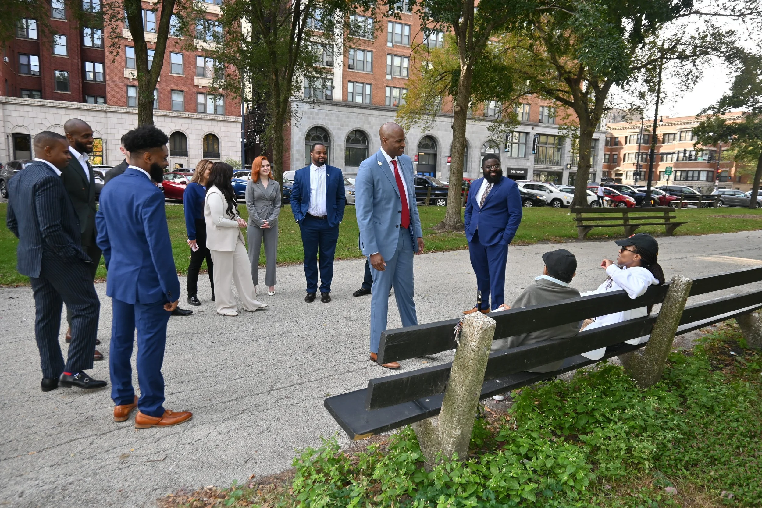 Hyde Park NWM photoshoot with GG Marketing LLC outside for an on-capture media shoot. Notice a candid interaction with locals!