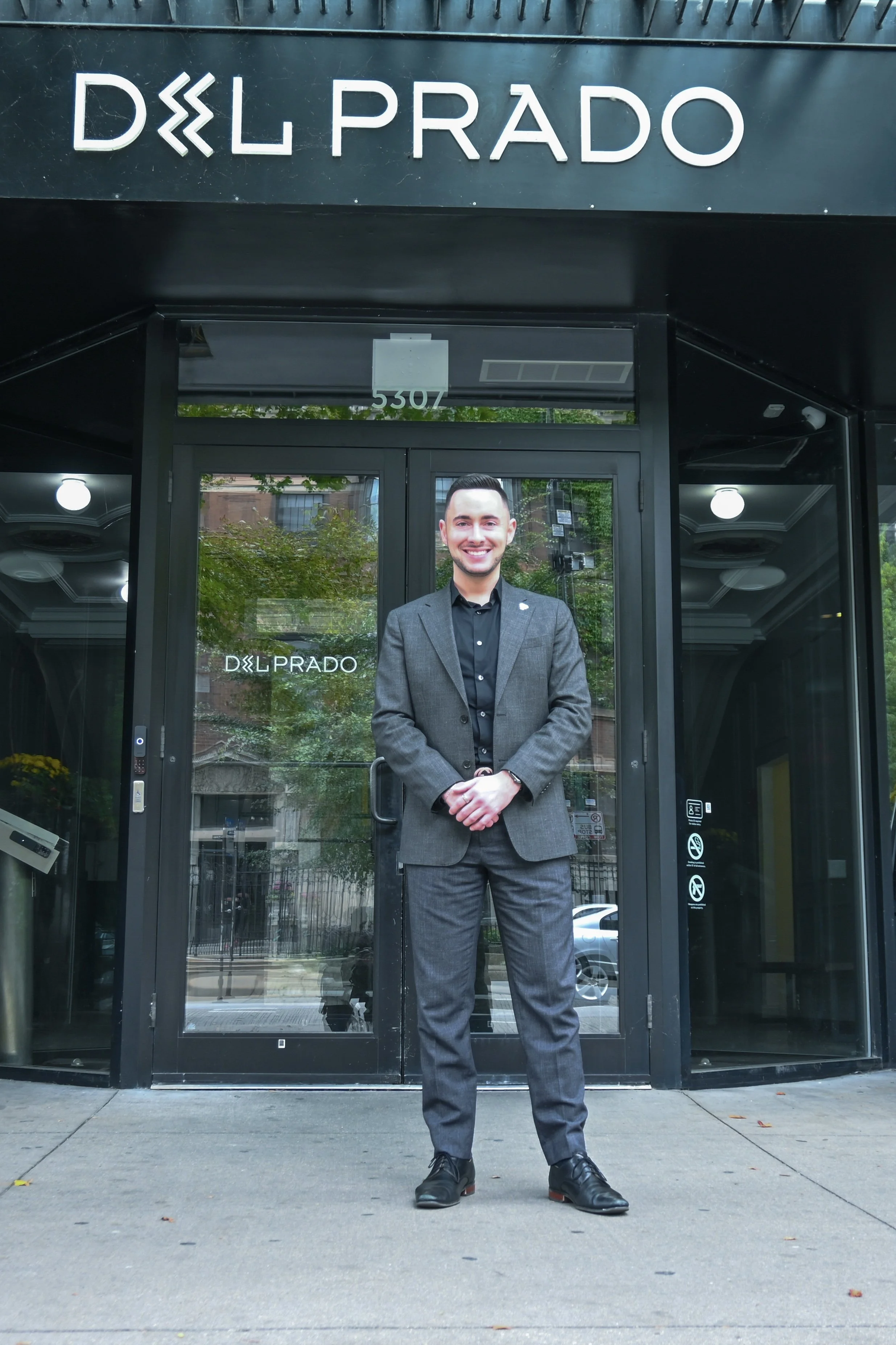 NWM Hyde Park's Robert Bedford Standing in Front of Del Prado Building.