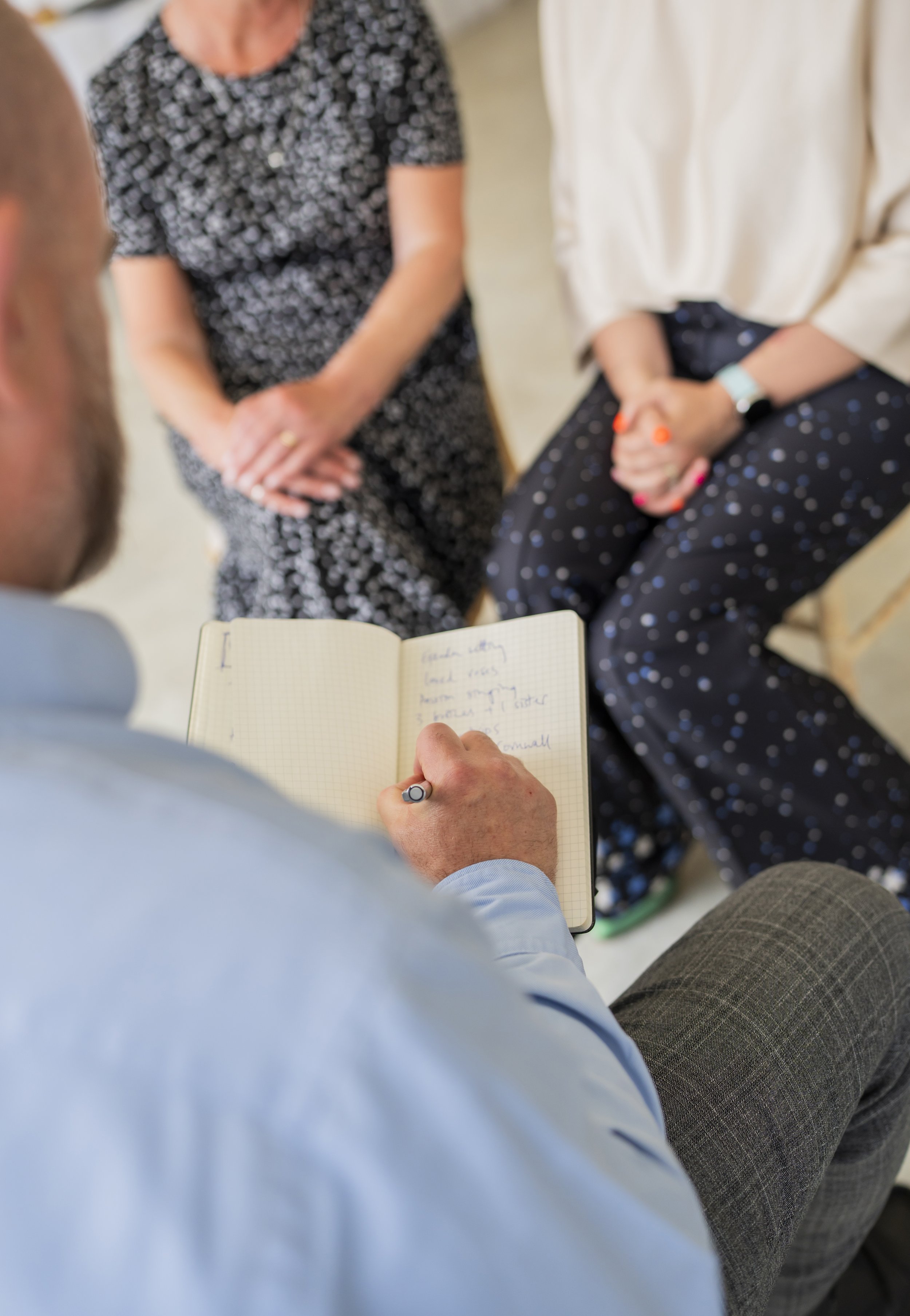 Hand of a person writing in a notebook