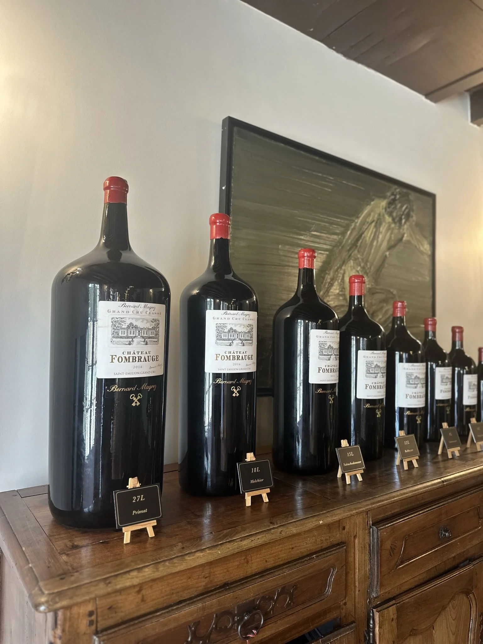 wander-senses-saint-emilion-chateau-fombrauge-wine-bottles-france.JPEG