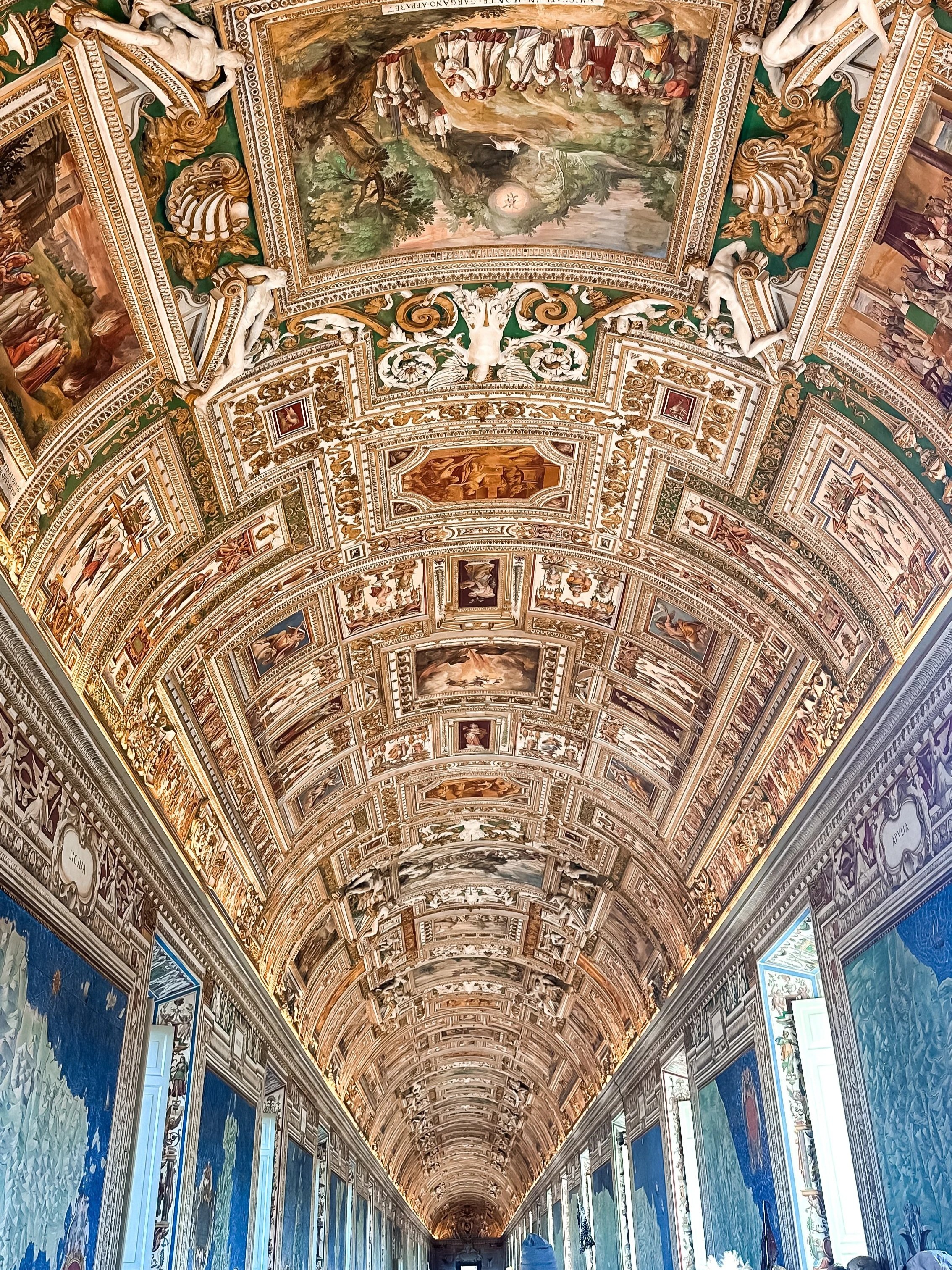wander-senses-rome-travel-guide-vatican-museum-ceiling-with-paintings.jpg
