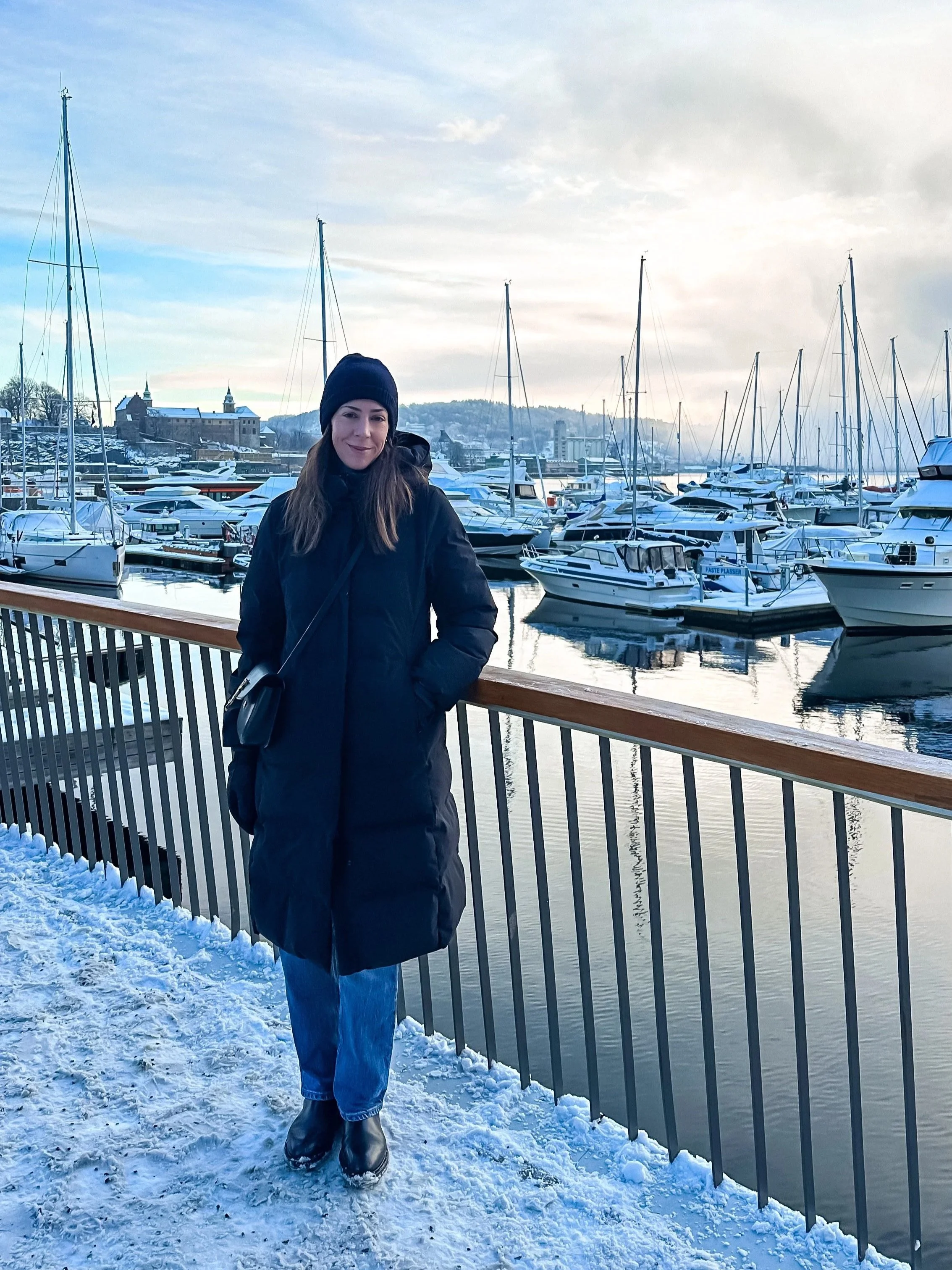 wander-senses-norway-oslo-guide-woman-at-harbor.jpg