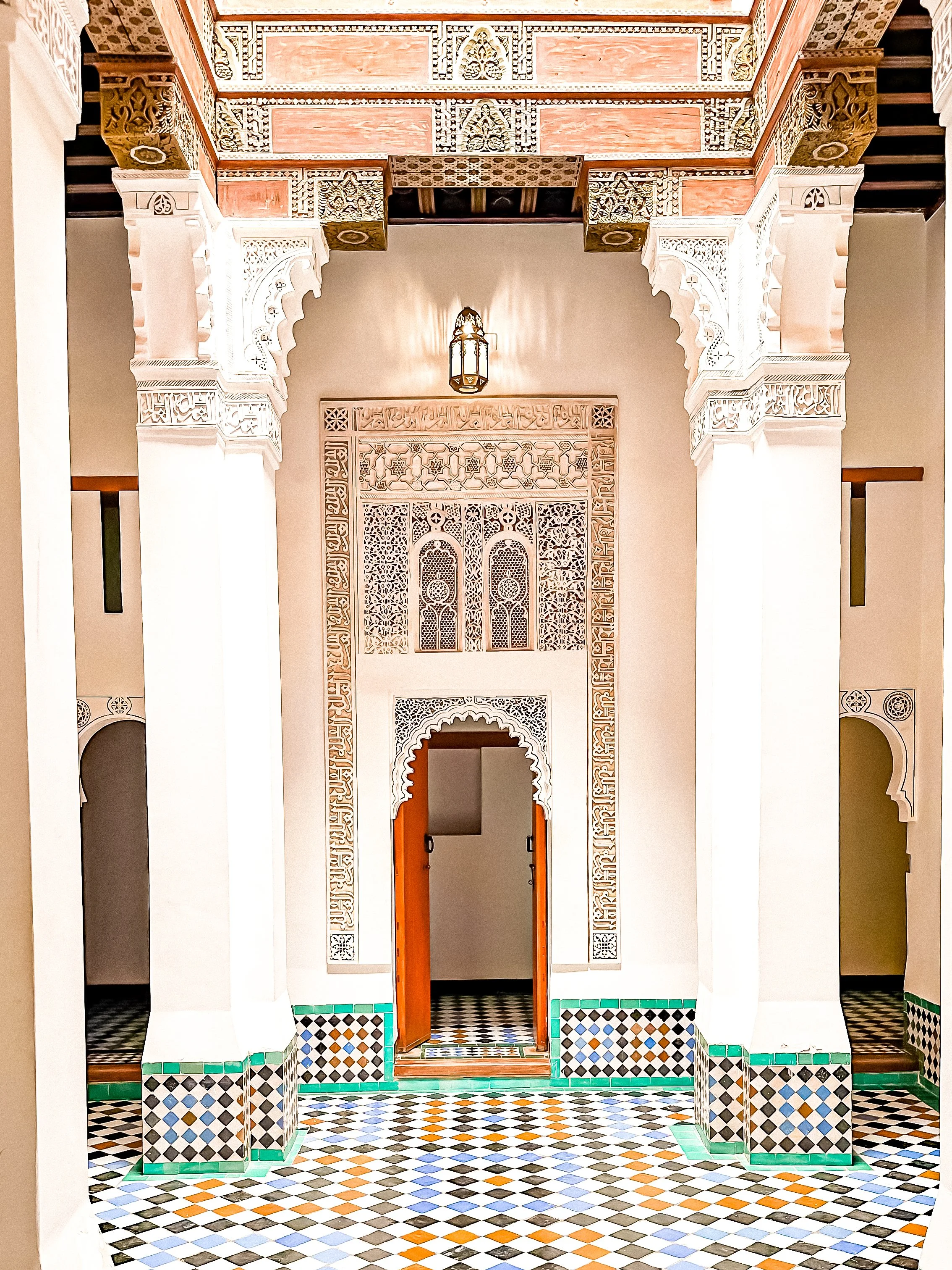 wander-senses-marrakech-ben-youssef-medersa-interiors-with-colorful-mosaics.png