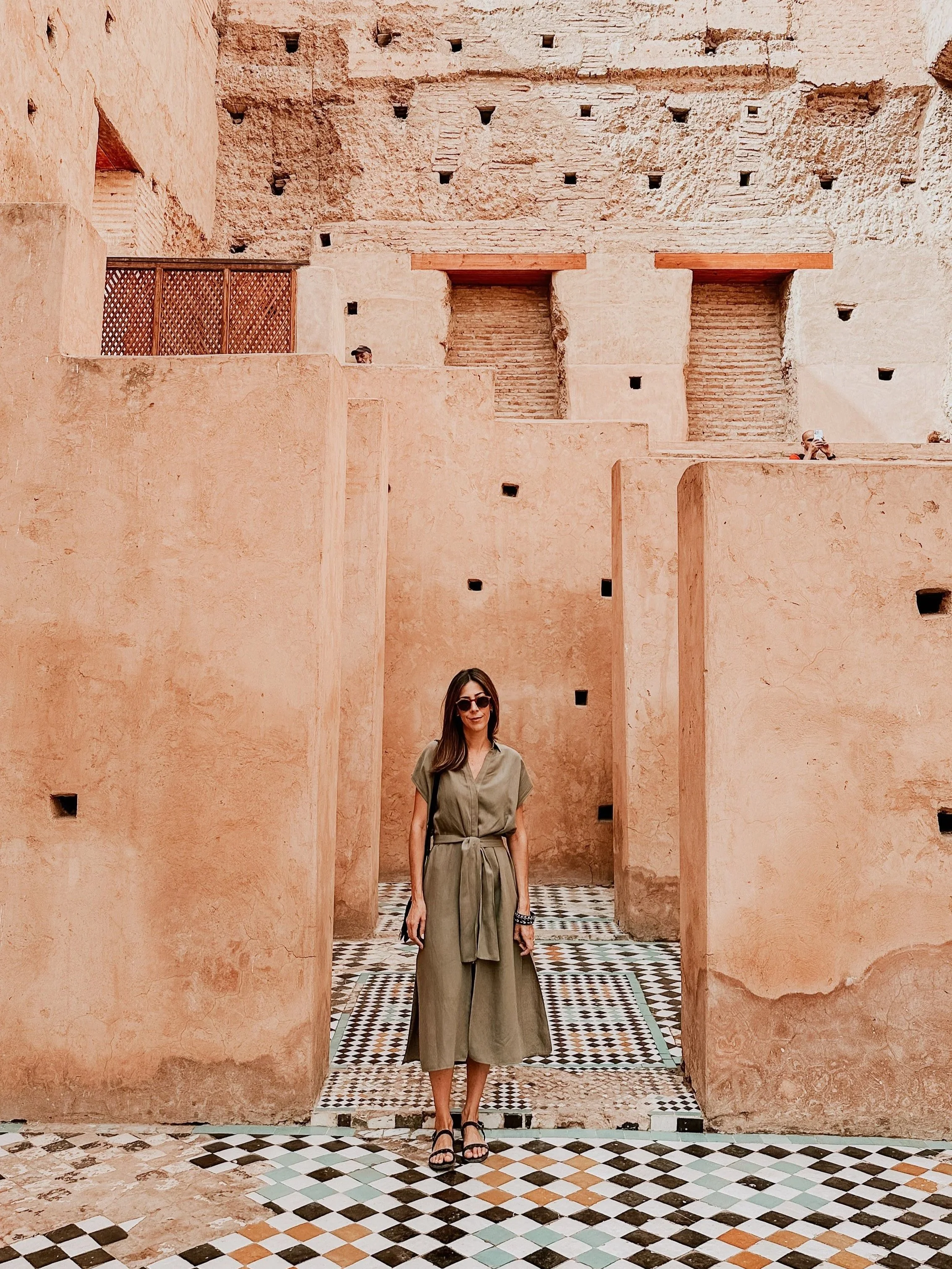 wander-senses-marrakech-el-badi-palace-ruins-and-woman-looking.jpg
