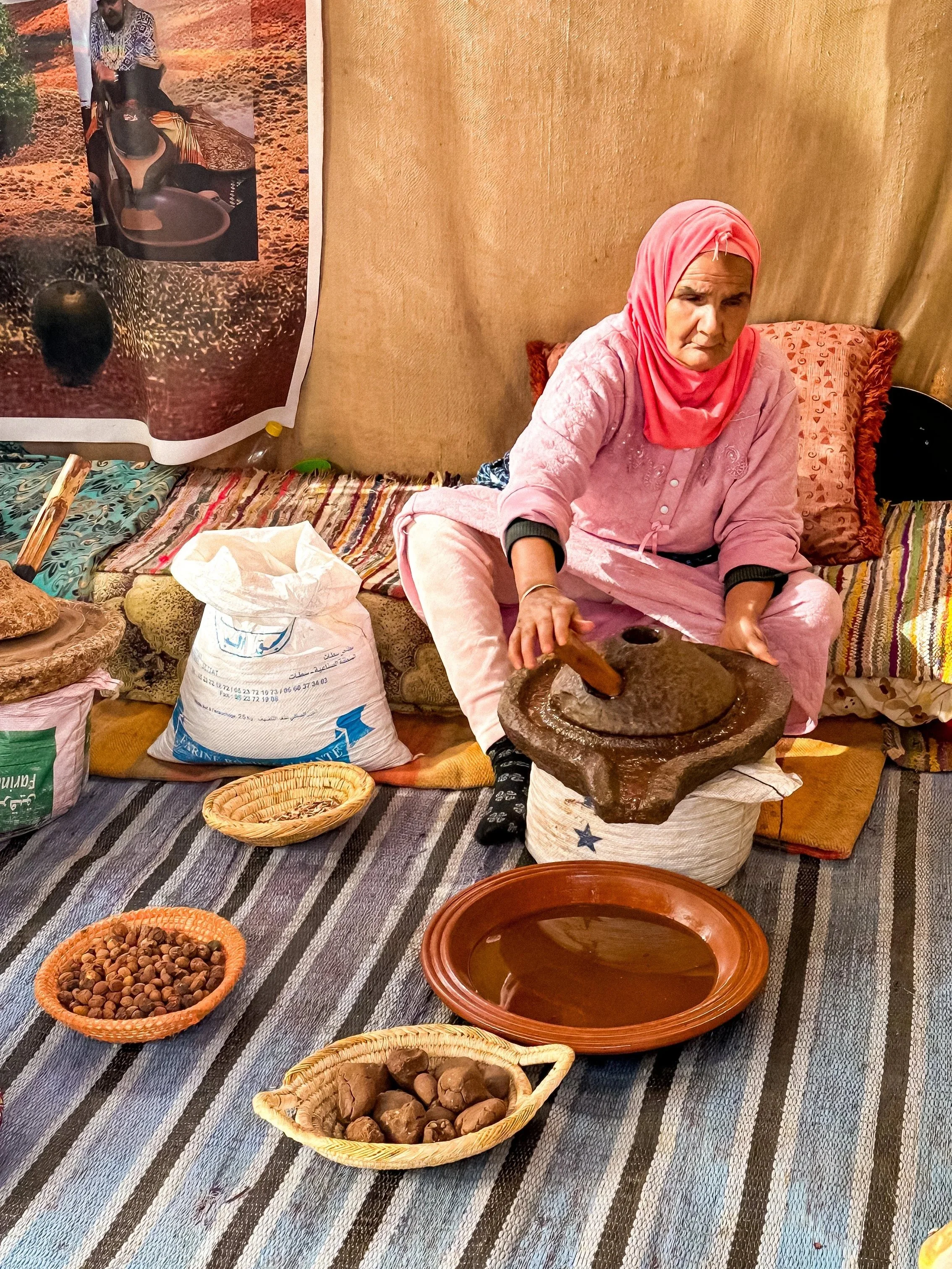 wander-senses-marrakech-imlil-atlas-mountains-woman-making-argain-oil.jpg