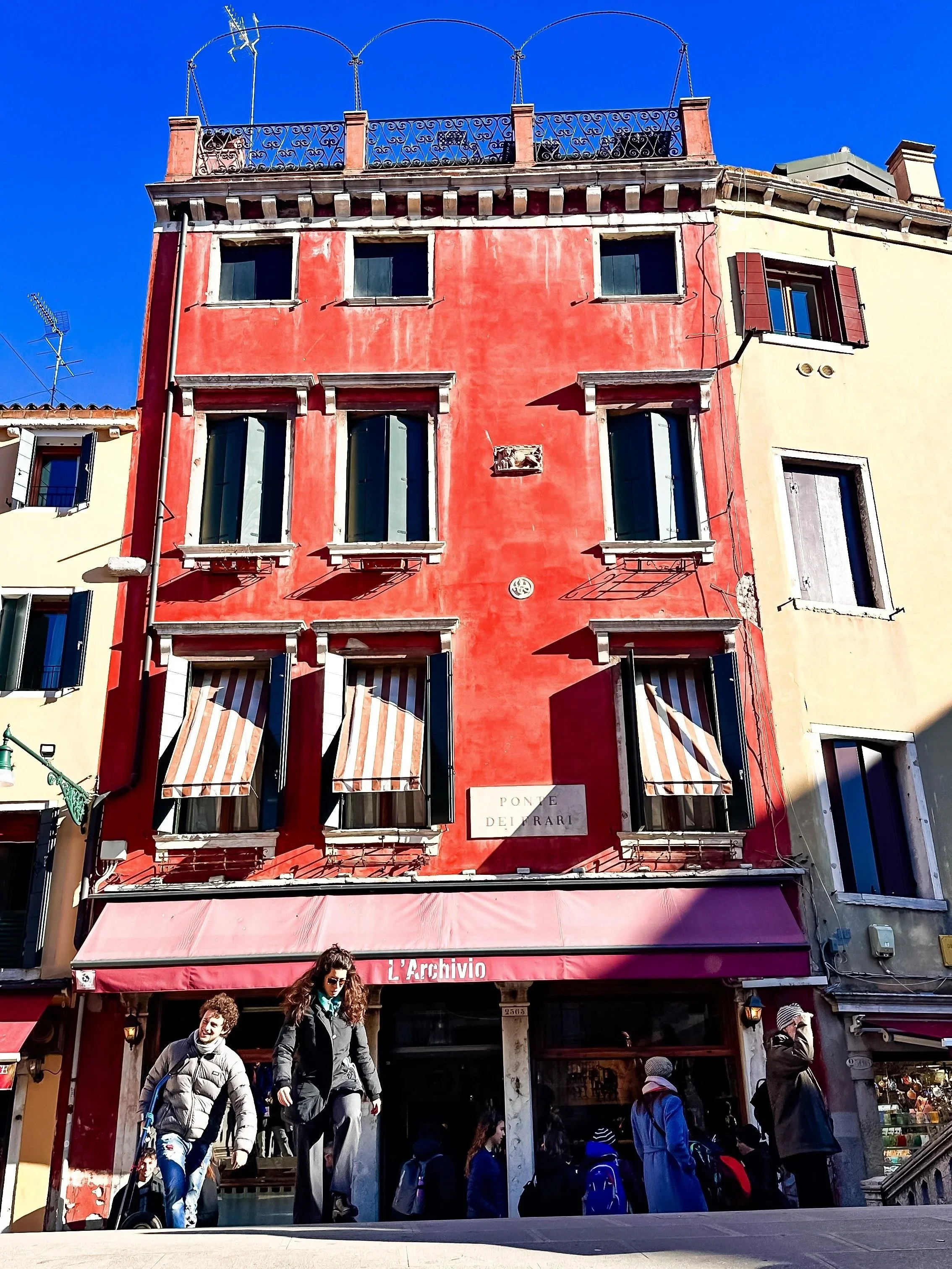 wander-senses-ponte-dei-frari-red-buidling-venice-italy.jpg
