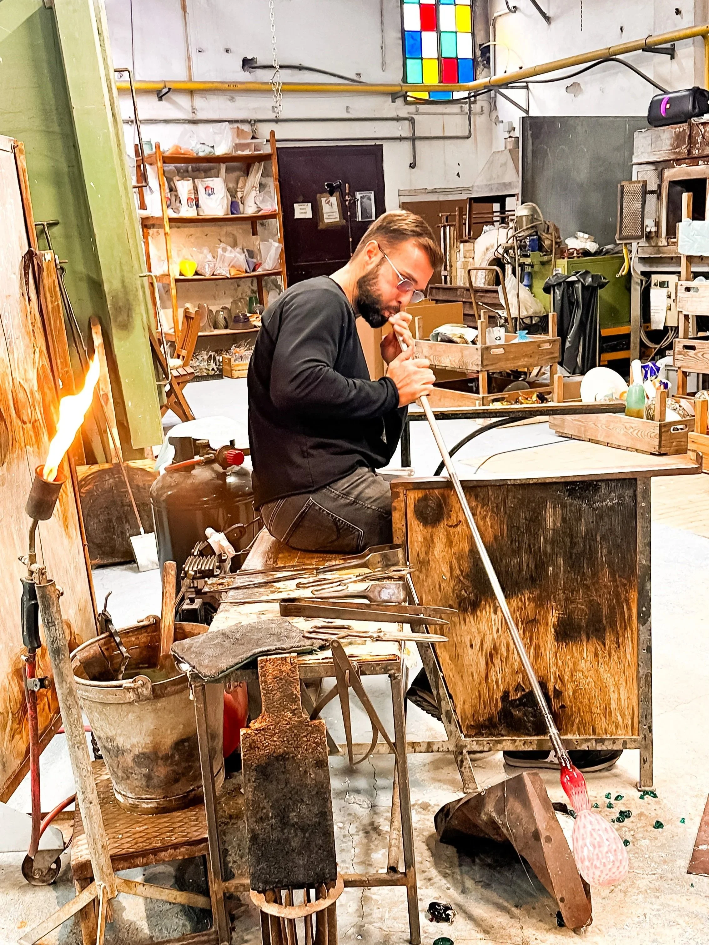 wander-senses-murano-glass-factory-man-blowing-a-vase.jpg