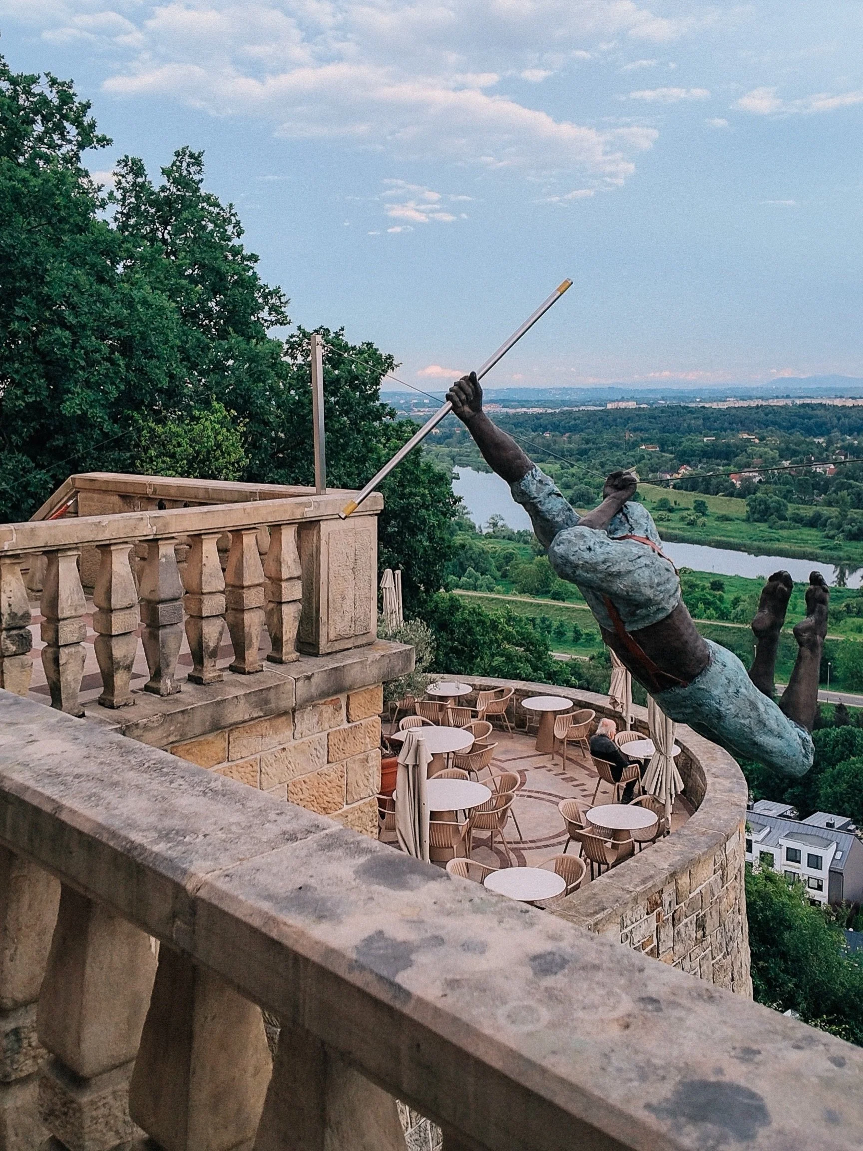 One of the most unexpected places I visited in Krak&oacute;w was Zinar Castle.

Hidden among the trees above the city, it overlooks the Vistula River and has an unusual history. The original tower was designed before World War II, and during the occu