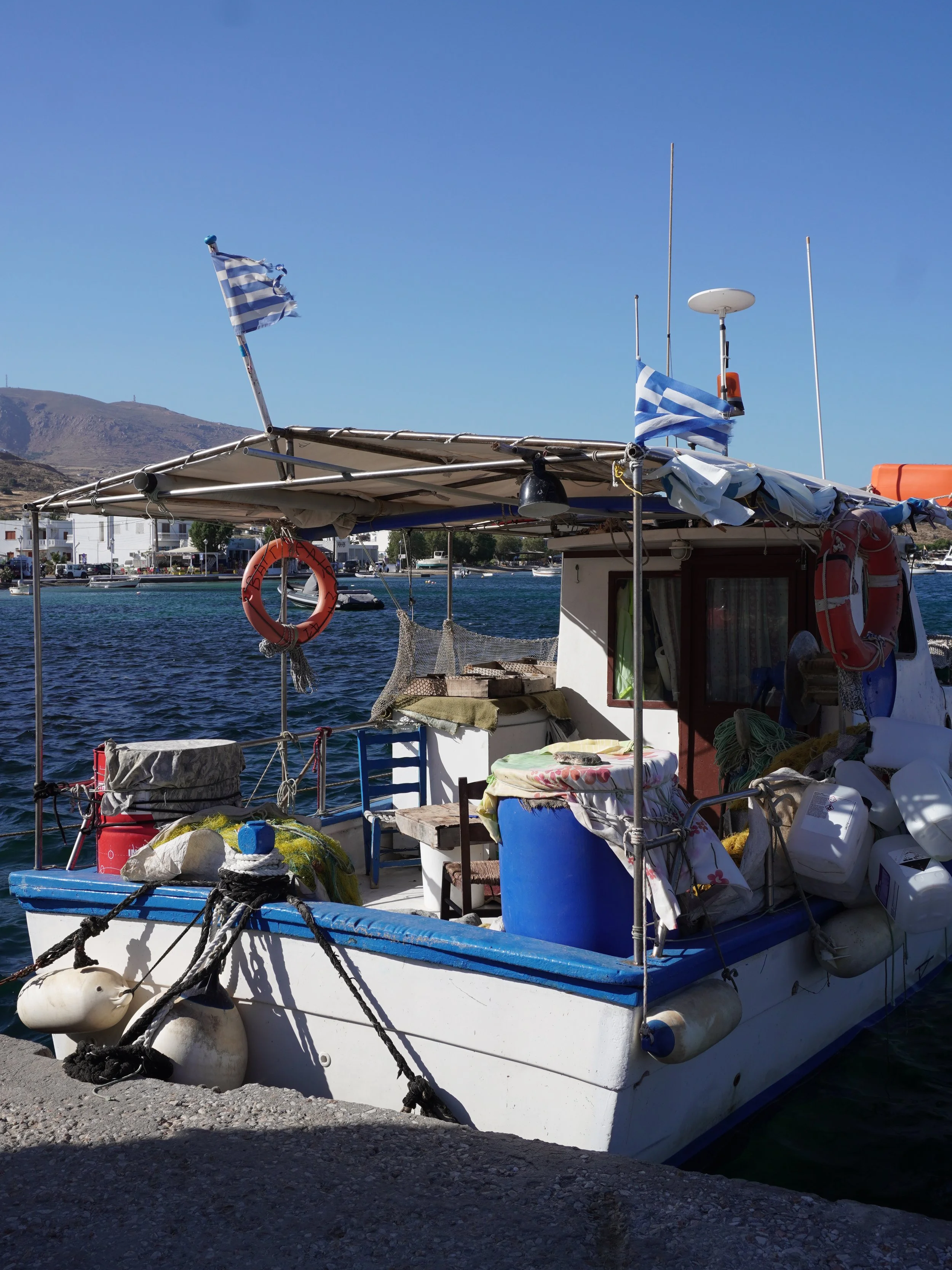 wander-senses-serifos-livadi-bay-boats.jpg.png