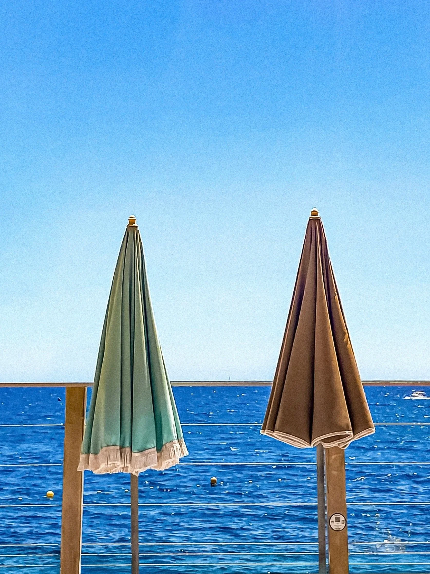 sun umbrellas and the sea view in Nice