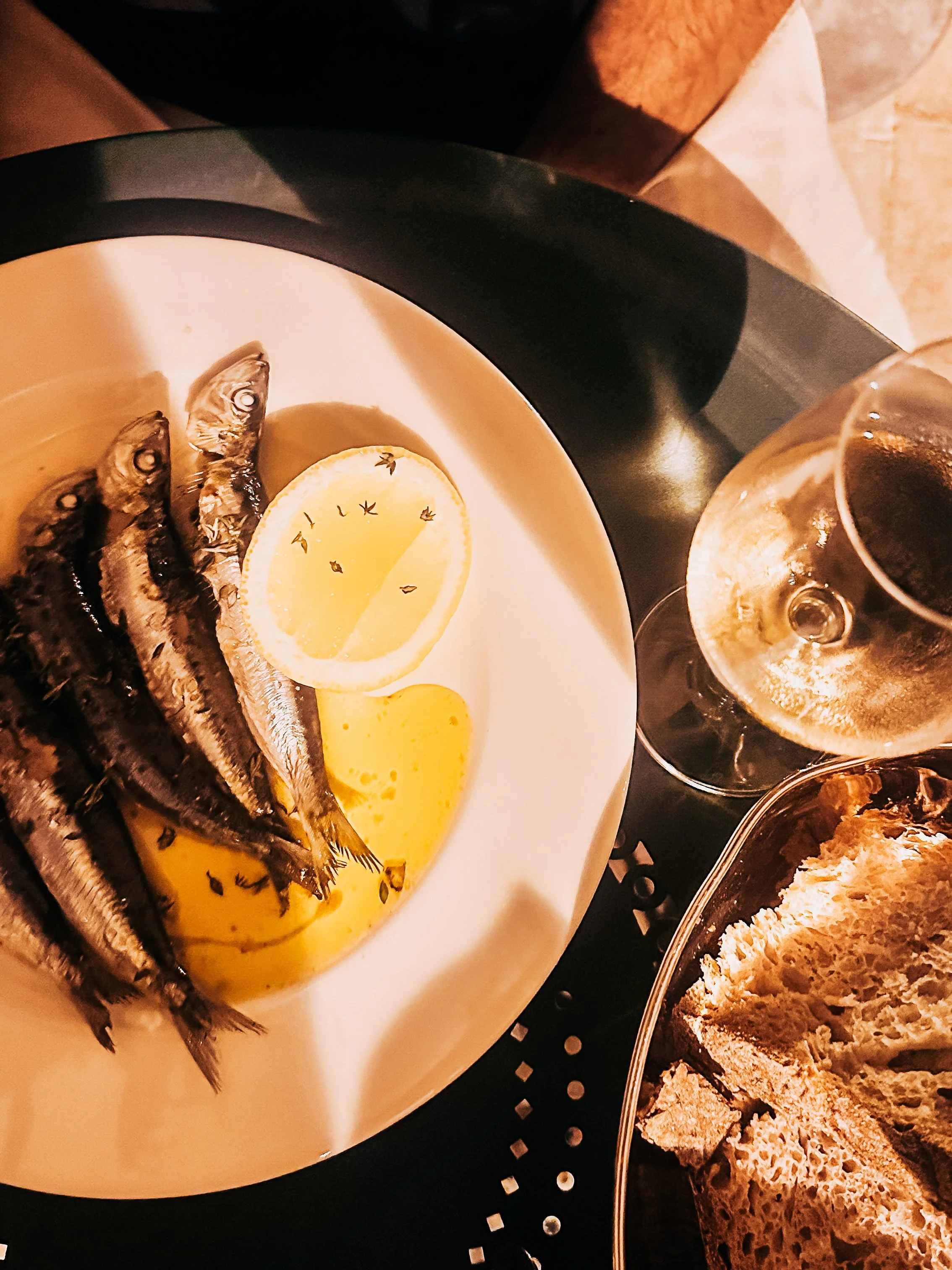 dish of sardines and wine at Bistrot des Serruriers  in Nice