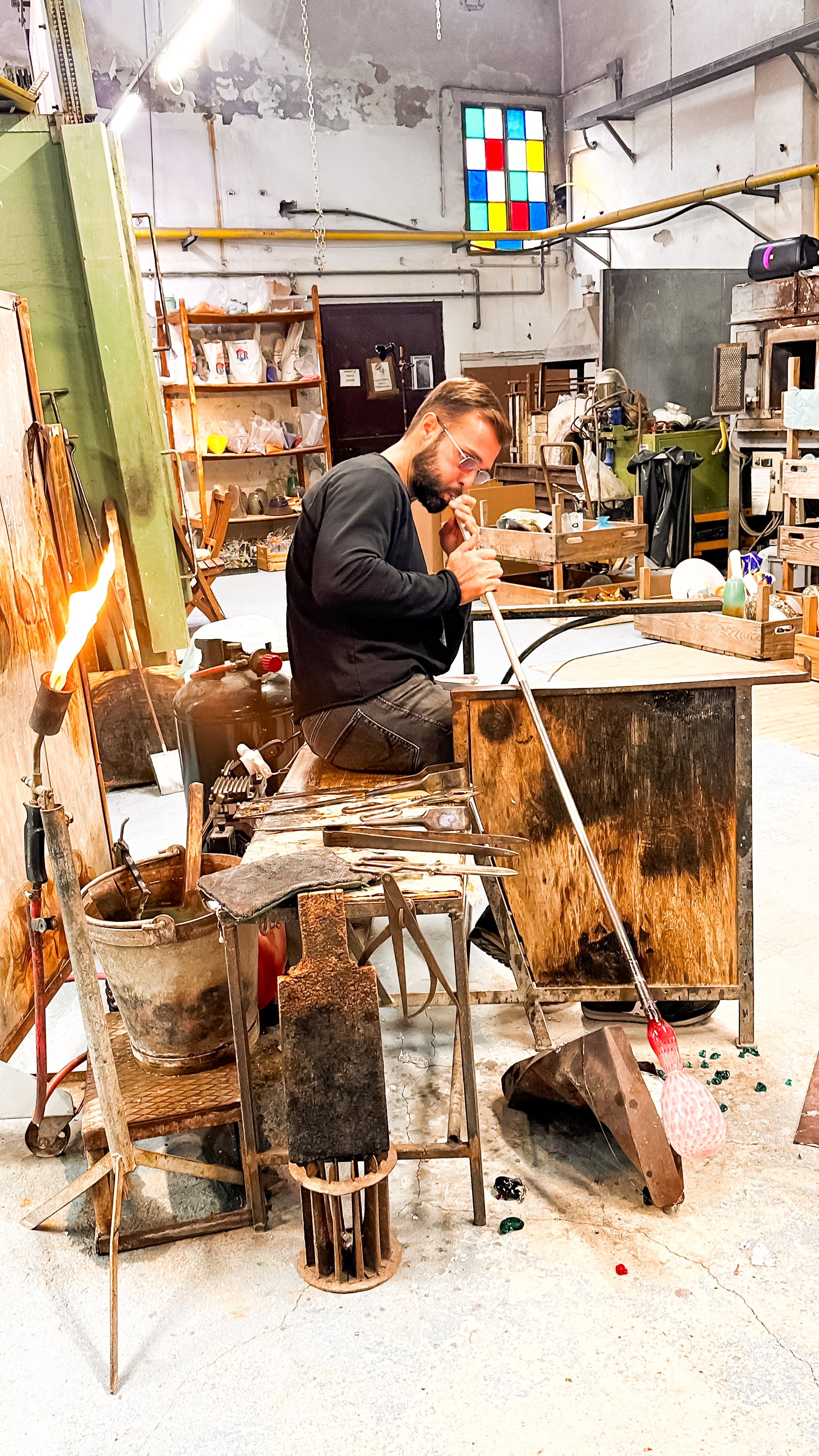 wander-senses-murano-glass-factory-man-blowing-a-vase.jpg