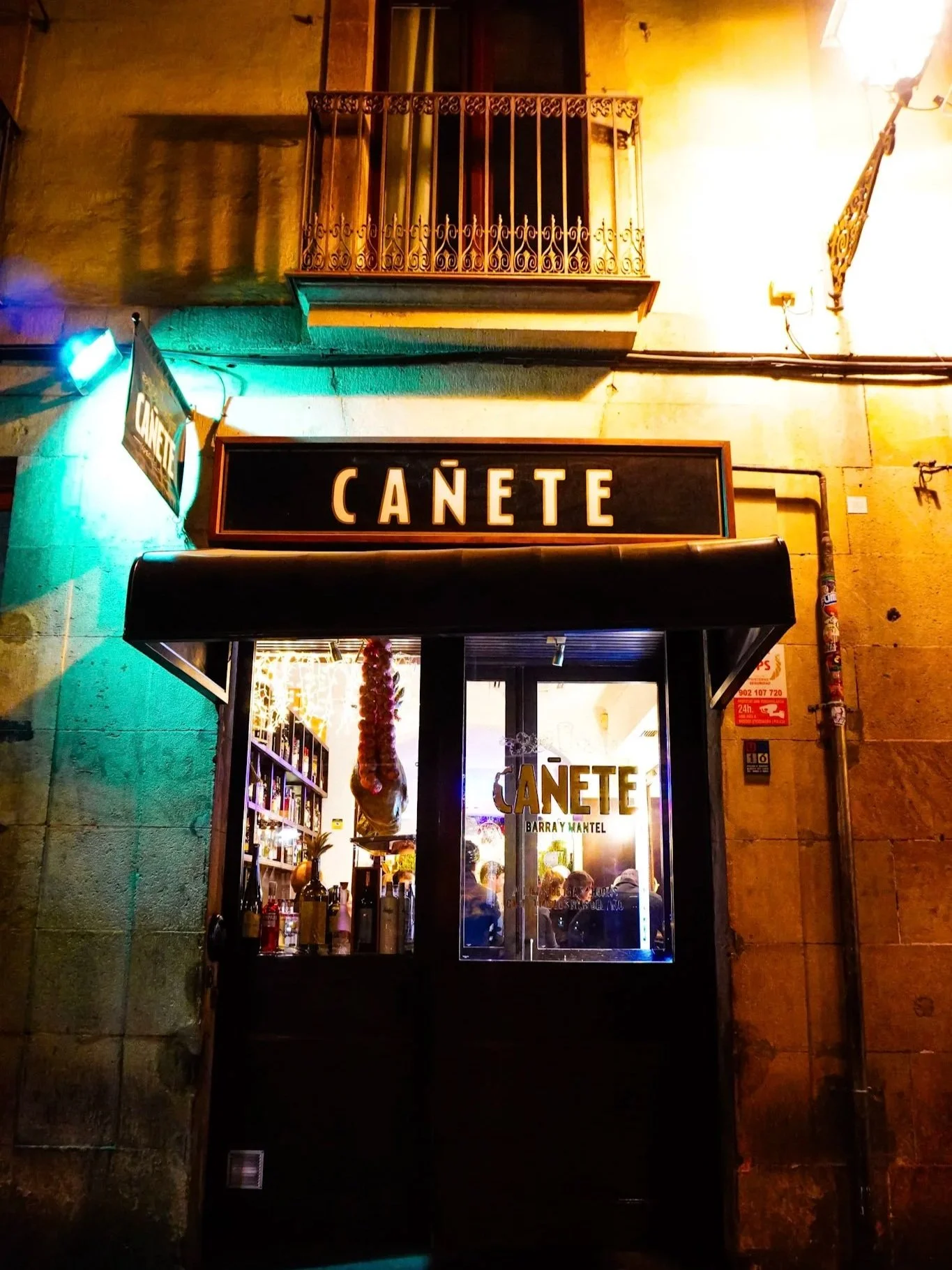 exterior of Canete bar at night in Barcelona