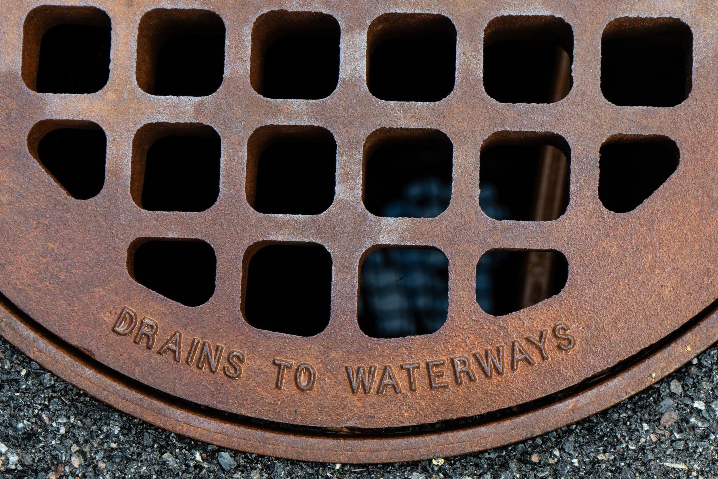 A storm drain located in the parking lot outside of Camillus Mills above Ninemile Creek. This property has been identified by the New York State Department of Environmental Conservation as being affected by industrial pollution contamination. 