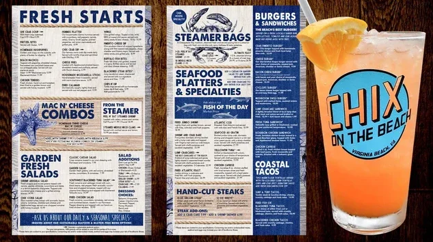 Photo of a restaurant menu, a cocktail with a logo saying 'Chix on the Beach', and a lemon wedge on top of the cocktail glass.